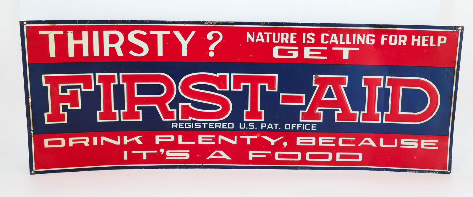 TIN "FIRST-AID" DRINK ADVERTISING SIGN: PAINTED AND EMBOSSED METAL. "THIRSTY? NATURE IS CALLING FOR HELP GET FIRST-AID, DRINK PLENTY BECAUSE IT'S A FOOD". MRKD. "THE CROWN CORK AND SEAL CO.,BALTIMORE U.S.A" 9 7/8" X 27 3/4". PLEASE READ CAR