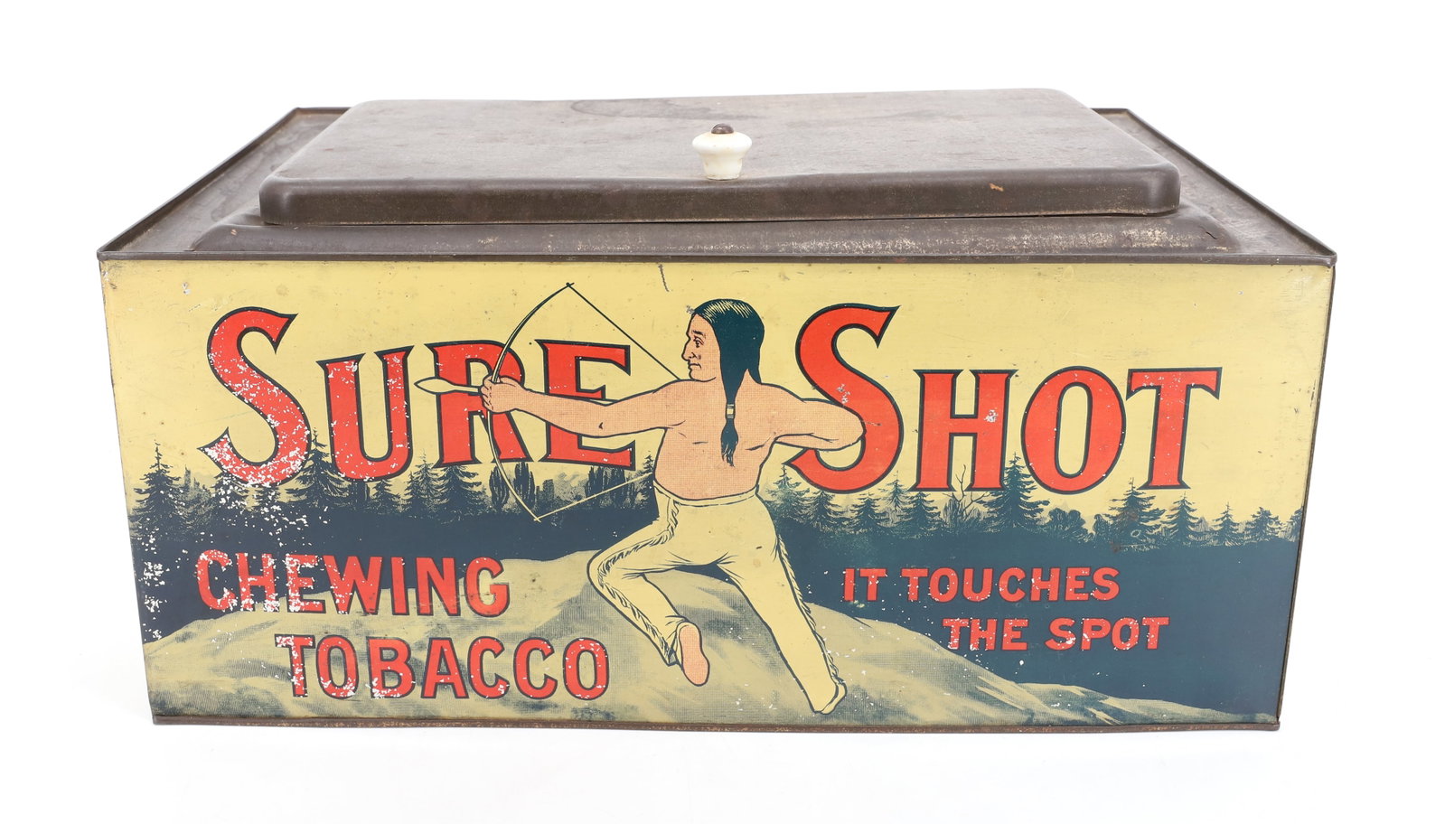 SURE SHOT CHEWING TOBACCO: TIN LITHO WITH HINGED LID AND PORCELAIN KNOB. "IT TOUCHES THE SPOT". 7 1/4" X 15 1/4" X 10 1/4". PLEASE READ CAREFULLY - Terms for Purchasing and Shipping of Auction Items. Please read carefully befor