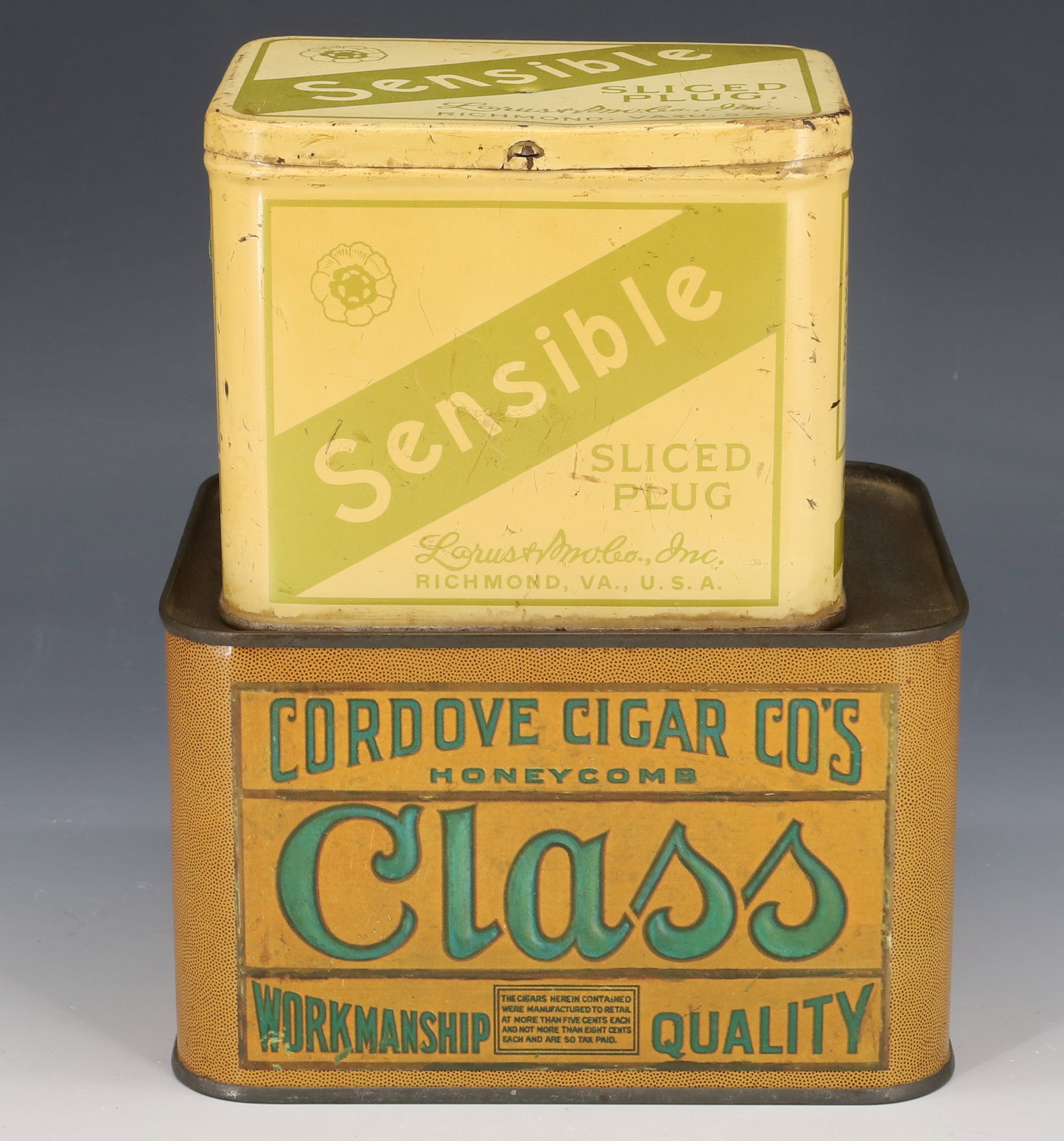 (2) TIN LITHO TOBACCO TINS: SENSIBLE SLICED PLUG (RICHMOND, VA) AND CLASS, CORDOVA CIGAR CO'S" WITH PEACOCK ON EITHER END. 3 1/2" X 5 3/4" X 4 1/2". PLEASE READ CAREFULLY - Terms for Purchasing and Shipping of Auction Items. Ple