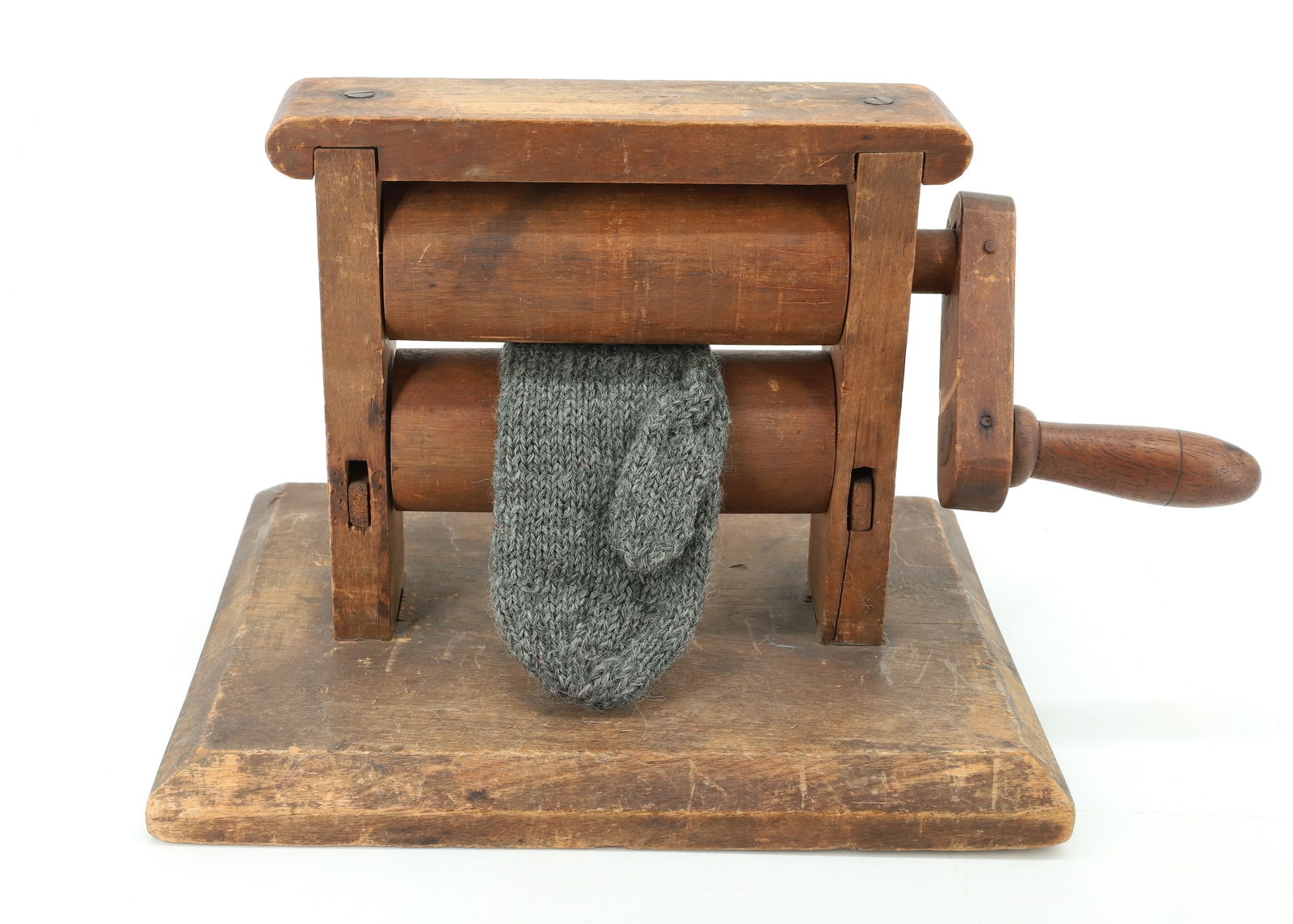 WOODEN MITTEN WRINGER: PRIMITIVE WRINGER WITH TWO ROLLERS AND CRANK. WOODEN BASE. 7 1/4" X 10" X 8". PLEASE READ CAREFULLY - Terms for Purchasing and Shipping of Auction Items. Please read carefully before bidding. Hartzell