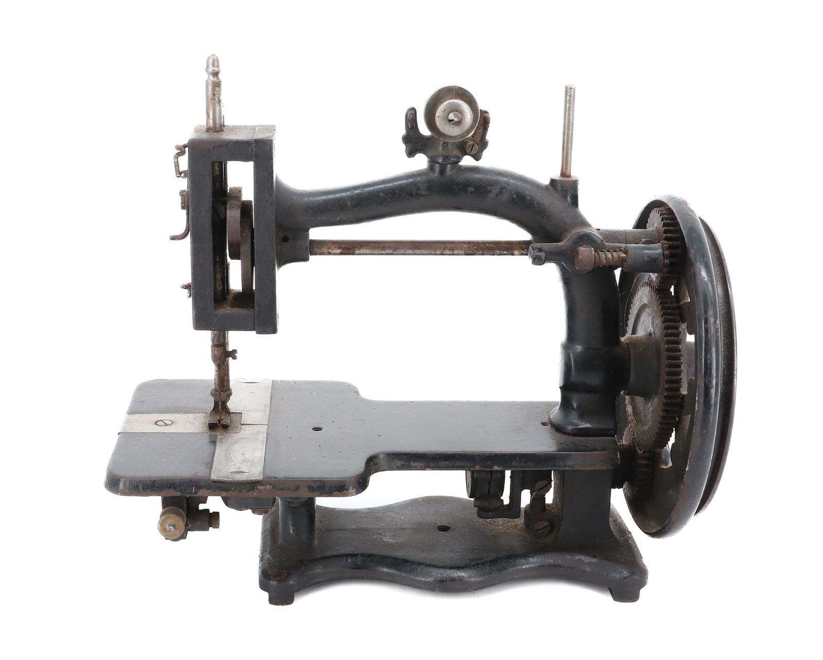 W.A. HENDERSON & CO. SEWING MACHINE: MRKD. CLEVELAND, OHIO. BLACK PAINTED SURFACE. 10 1/4" L. PLEASE READ CAREFULLY - Terms for Purchasing and Shipping of Auction Items. Please read carefully before bidding. Hartzell’s Auction Gall