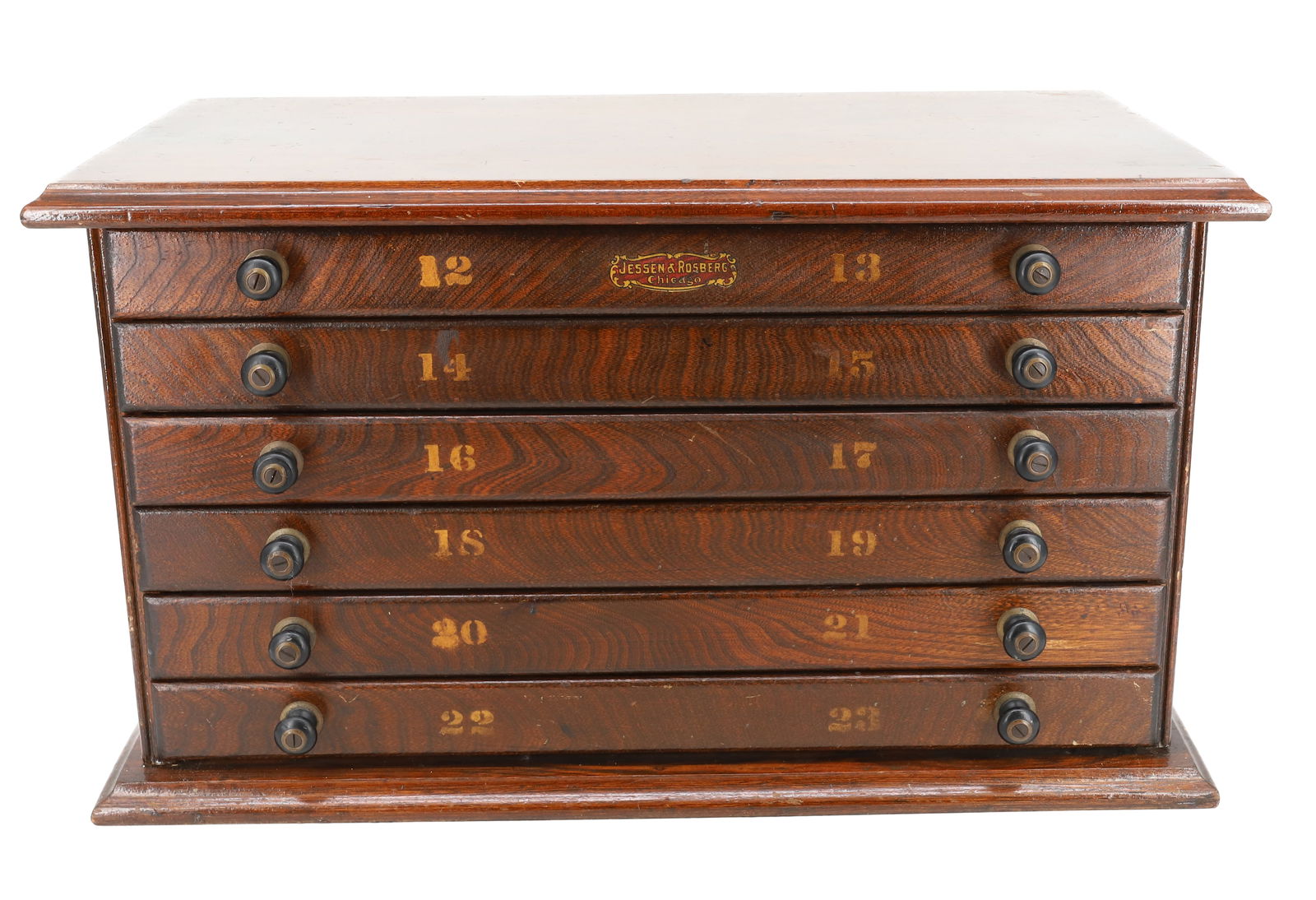 JESSEN & ROSBERG, MULTI-DRAWER CABINET: WATCHMAKER'S OR SPOOL-TYPE CABINET. SIX DRAWERS WITH STENCILED NUMBERS AND ORIGINAL LABEL. 12 1/2" X 21 3/4" X 12". PLEASE READ CAREFULLY - Terms for Purchasing and Shipping of Auction Items. Please r