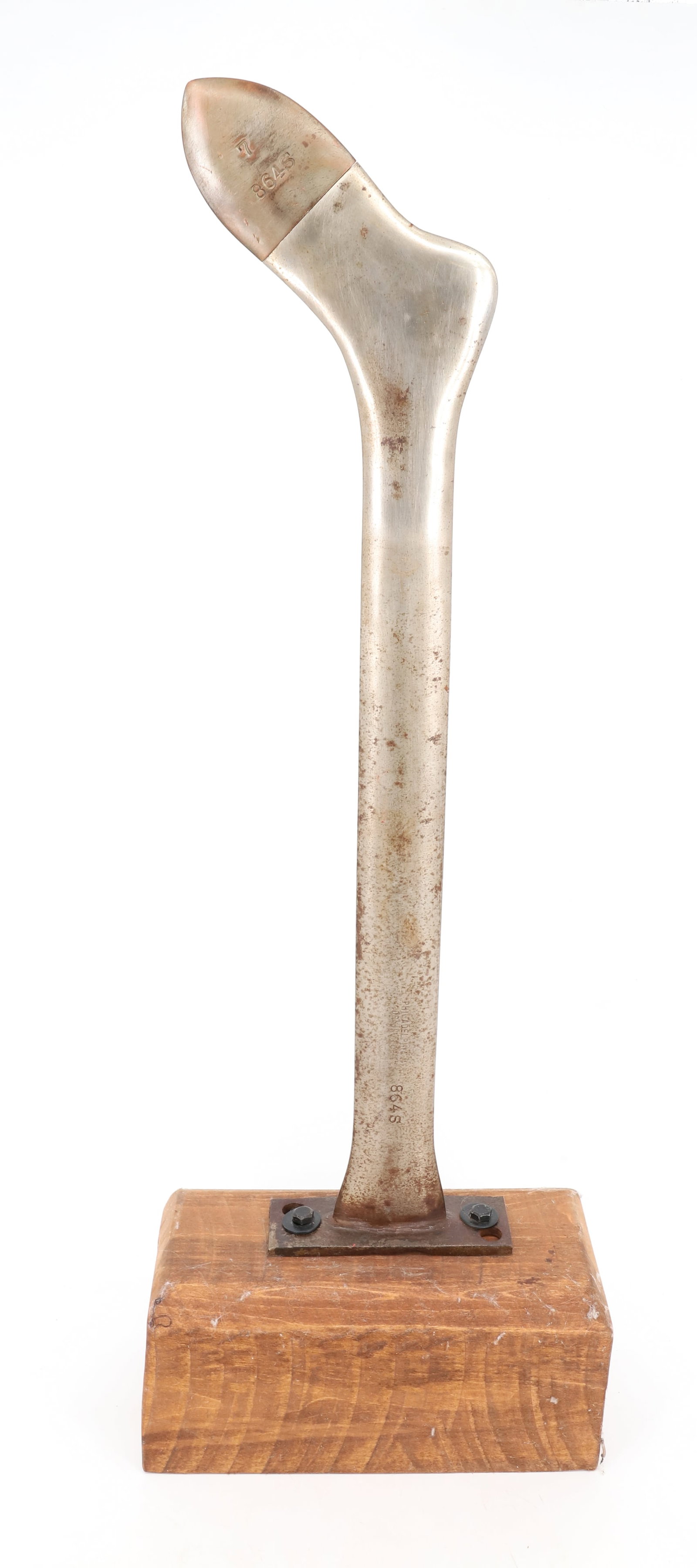 VINTAGE INDUSTRIAL STOCKING FORM: METAL FORM WITH REMOVABLE TIP. MOUNTED ON WOODEN DISPLAY BLOCK. FORM IS MRKD. PHILADELPHIA METAL DRYING FORM. 27 1/2" H. TOTAL HEIGHT WITH BASE 32 1/2". PLEASE READ CAREFULLY - Terms for Purchasing an