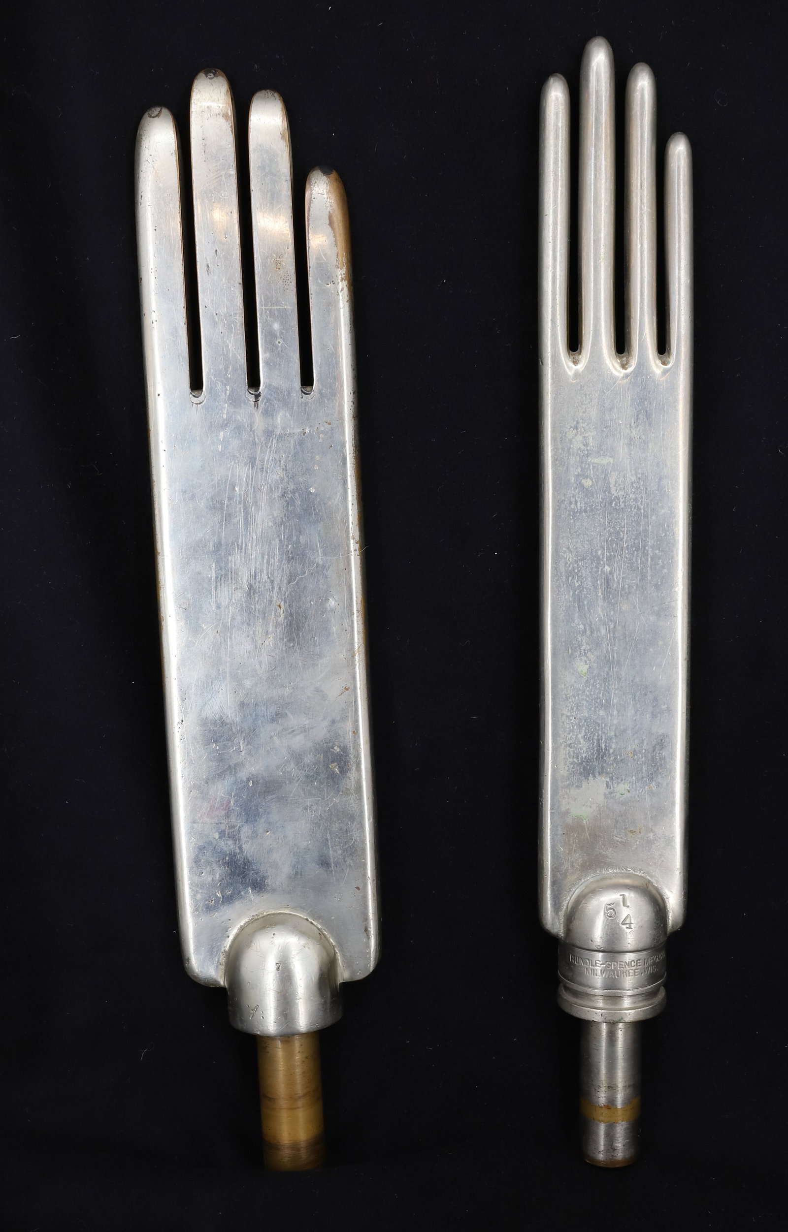 (2) NICKEL-BRASS GLOVE FORMS: HEAVY BRASS. NARROWER FORM IS MRKD. RUNDLE-SPENCE MFG. CO. MILWAUKEE, WIS. 17 1/4" TO 17 1/2" LENGTHS. PLEASE READ CAREFULLY - Terms for Purchasing and Shipping of Auction Items. Please read carefully