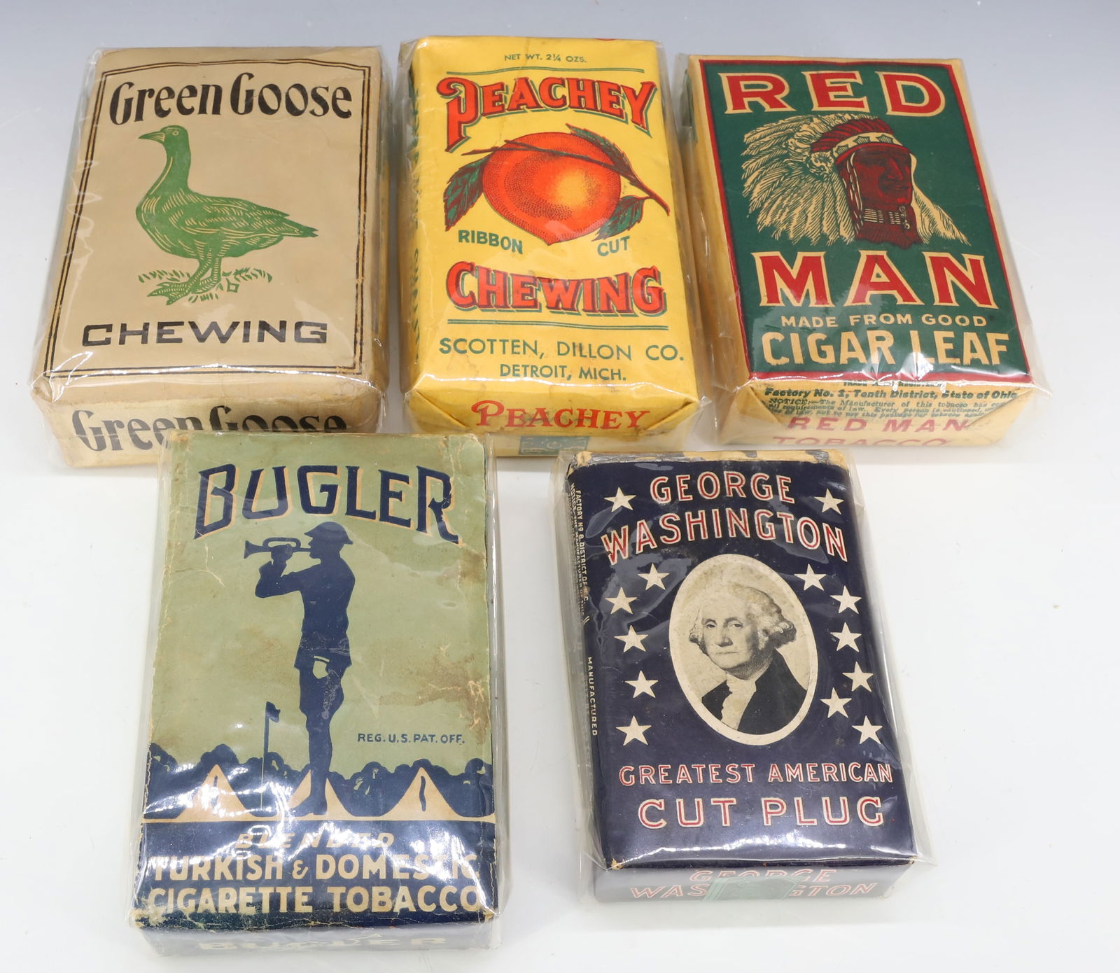 LOT OF PAPER LITHO TOBACCO PACKS: INCLUDING: BUGLER, GREEN GOOSE CHEWING, GEORGE WASHINGTON, PEACHEY CHEWING AND RED MAN. LARGEST 5" L. PLEASE READ CAREFULLY - Terms for Purchasing and Shipping of Auction Items. Please read carefully