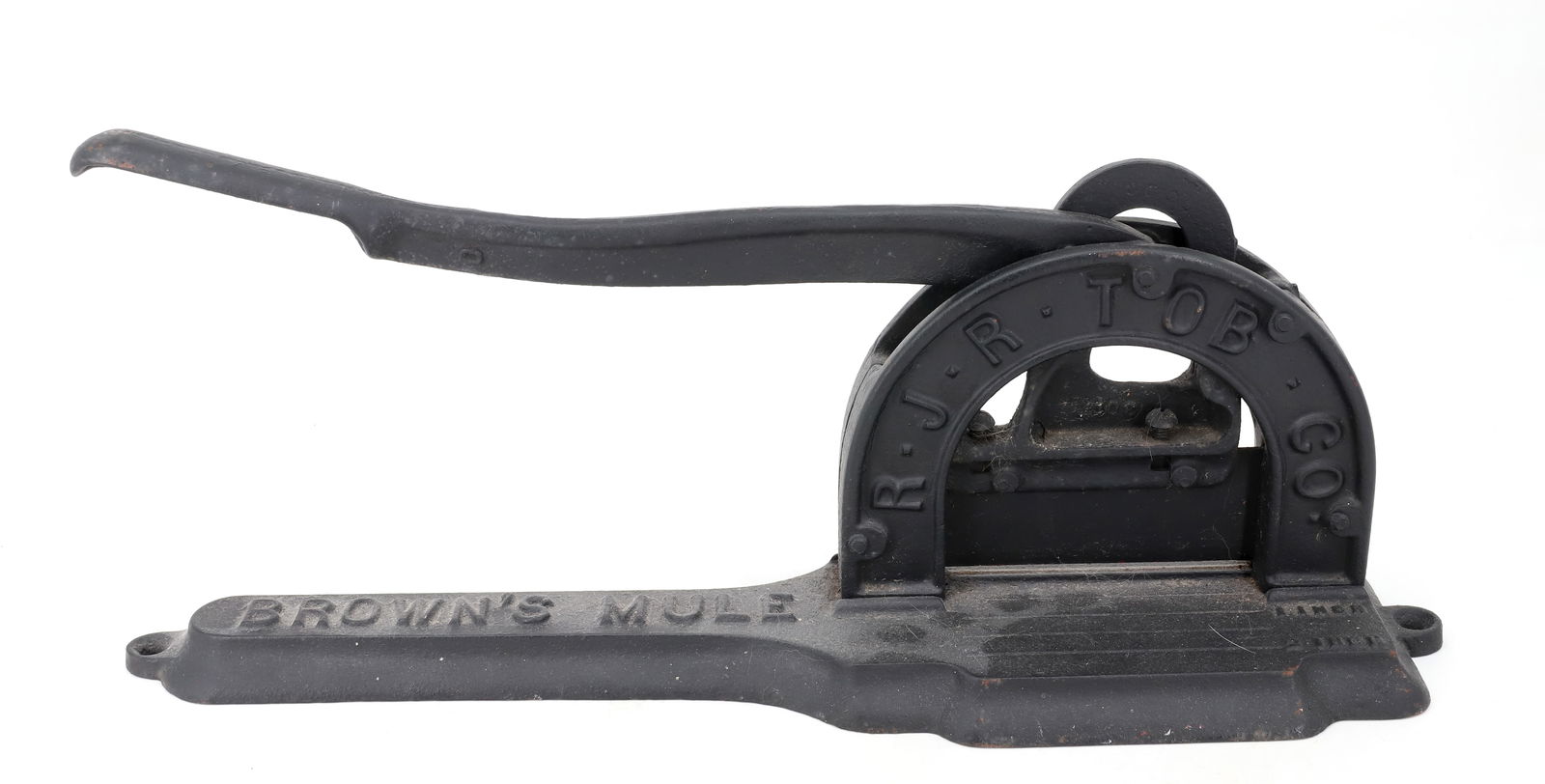 BROWN'S MULE TOBACCO CUTTER: CAST IRON ADVERTISING CUTTER MRKD. "R.J.R. TOB. CO." BLACK PAINTED SURFACE. 18 1/2" L. PLEASE READ CAREFULLY - Terms for Purchasing and Shipping of Auction Items. Please read carefully before bidding.