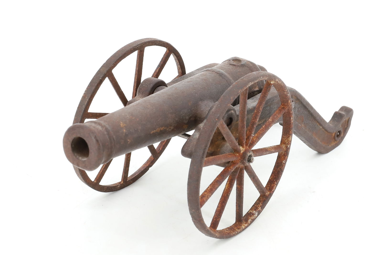 CAST IRON MODEL CANNON: CAST IRON FRAMEWORK AND BARREL (6 1/4" L. OPENING IS 1/2"). TOTAL SIZE 9 1/4" L. PLEASE READ CAREFULLY - Terms for Purchasing and Shipping of Auction Items. Please read carefully before bidding. Hartz