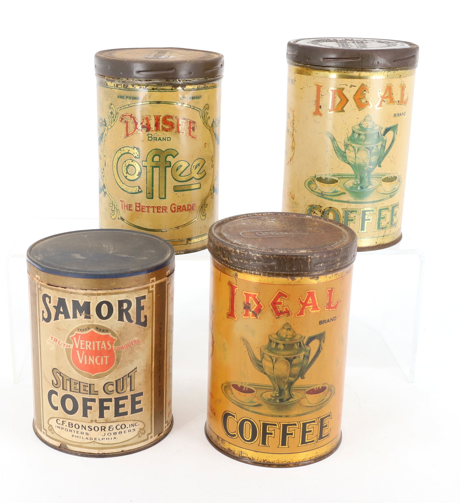 LOT (4) COFFEE ADVERTISING TINS: TWO TIN LITHO "IDEAL BRAND COFFEE" TINS (NEWARK, NJ), "DAISEE BRAND COFFEE" (PATERSON, NJ) AND "SAMORE" PAPER LITHO LABEL ON TIN (PHILADELPHIA). 5 1/2" H. PLEASE READ CAREFULLY - Terms for Purchasing
