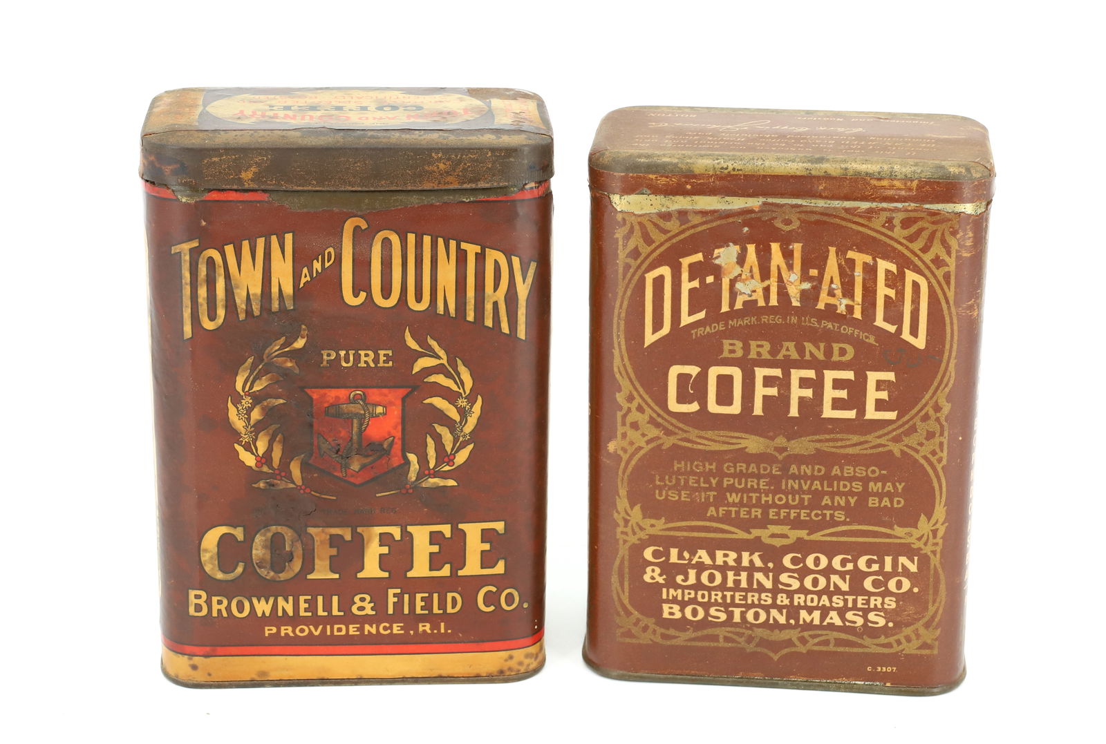 (2) PAPER LITHO LABEL COFFEE TINS: TOWN AND COUNTRY PURE COFFEE (PROVIDENCE, RI) AND "DE-TAN-ATED COFFEE, BOSTON, MASS" 6 1/4" H. PLEASE READ CAREFULLY - Terms for Purchasing and Shipping of Auction Items. Please read carefully before