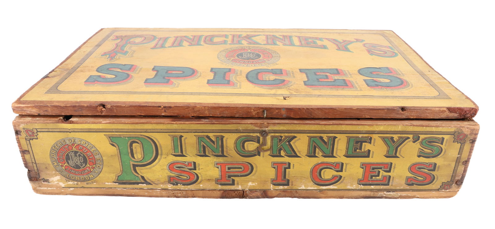 PINCKNEY'S SPICES ADVERTISING BOX: PAPER LITHO LABEL ON OUTSIDE OF LID AND ON FRONT. STENCILED ON ONE END "...GENUINE BLACK PEPPER..." 4 1/2" X 19 1/2" X 12 3/4". PLEASE READ CAREFULLY - Terms for Purchasing and Shipping of Auction Ite