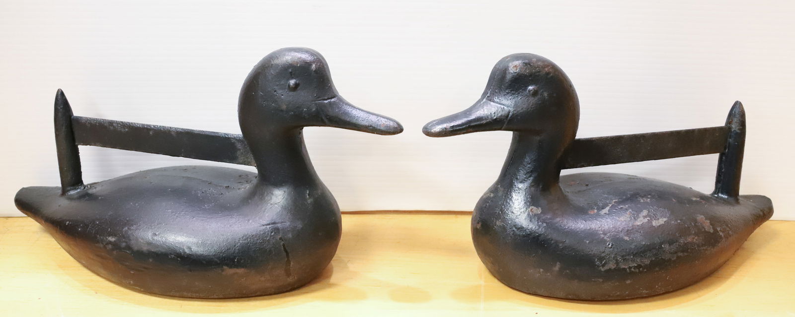 PAIR OF CAST IRON DUCK BOOT SCRAPERS: BLACK PAINTED DUCK BOOT SCRAPERS. HEAVY! (34 LBS. EACH) 14 1/2" L. PLEASE READ CAREFULLY - Terms for Purchasing and Shipping of Auction Items. Please read carefully before bidding. Hartzell’s Au