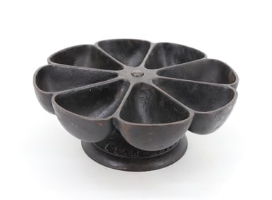 REVOLVING CAST IRON NAIL HOLDER