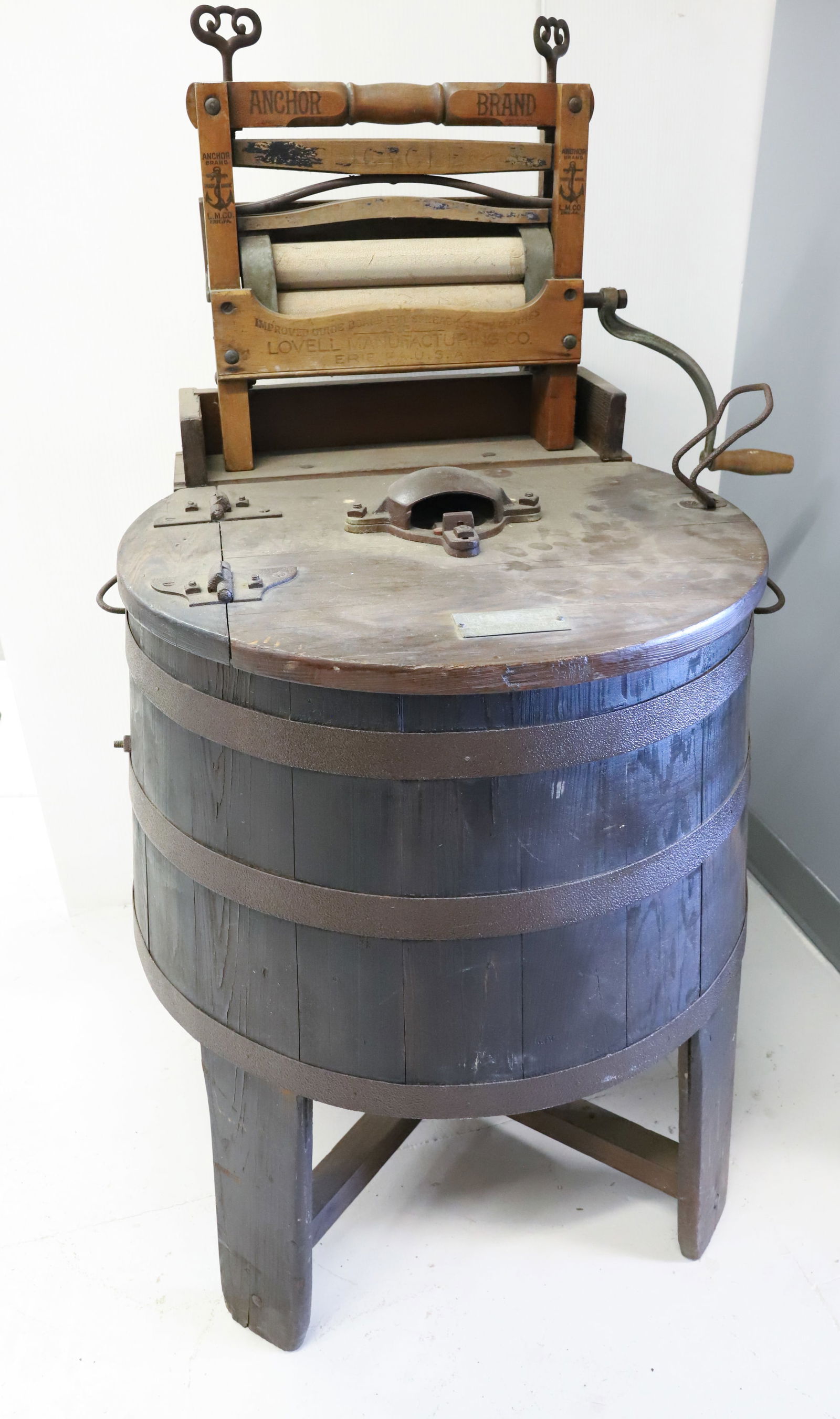 HIBBARD SPOTLESS WOODEN WASHING MACHINE: WOODEN HINGED LID WITH METAL/IRON FITTINGS. WITH, ANCHOR BRAND WRINGER ON TOP. 45" X 22" X 24". PLEASE READ CAREFULLY - Terms for Purchasing and Shipping of Auction Items. Please read carefully before