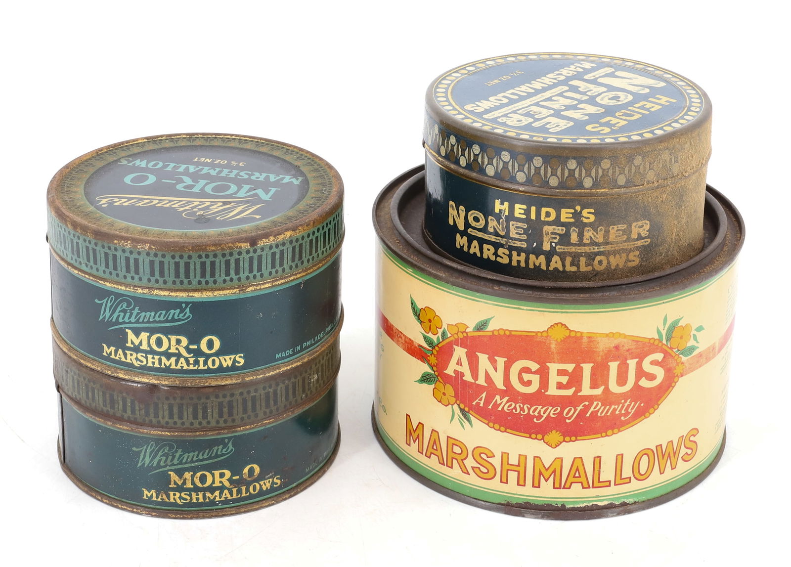 LOT OF MARSHMALLOW TINS: (4) TIN LITHO TINS INCLUDING: ANGELUS, HEIDE'S NONE FINER MARSHMALLOWS AND (2) WHITMAN'S MOR-O MARSHMALLOWS 4 1/4" D. PLEASE READ CAREFULLY - Terms for Purchasing and Shipping of Auction Items. Please
