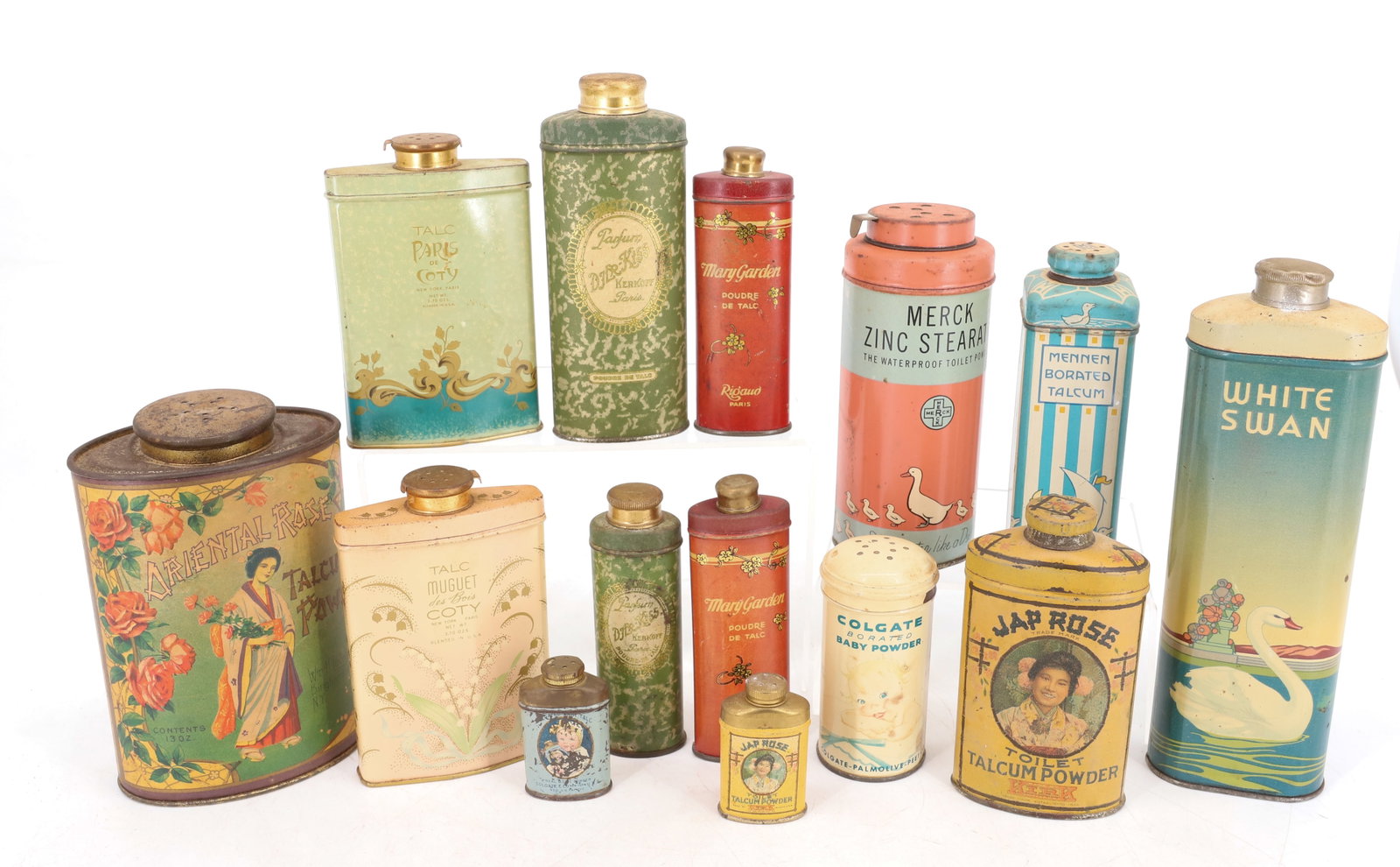 (14) TALC / TALCUM POWDER TINS: INCLUDING: WHITE SWAN, ORIENTAL ROSE, JAP ROSE ( 2 1/8" AND 4 1/2" HEIGHTS), (2) DJER-KISS,(2) MARY GARDEN (PARIS) AND MORE. PLEASE READ CAREFULLY - Terms for Purchasing and Shipping of Auction Items.