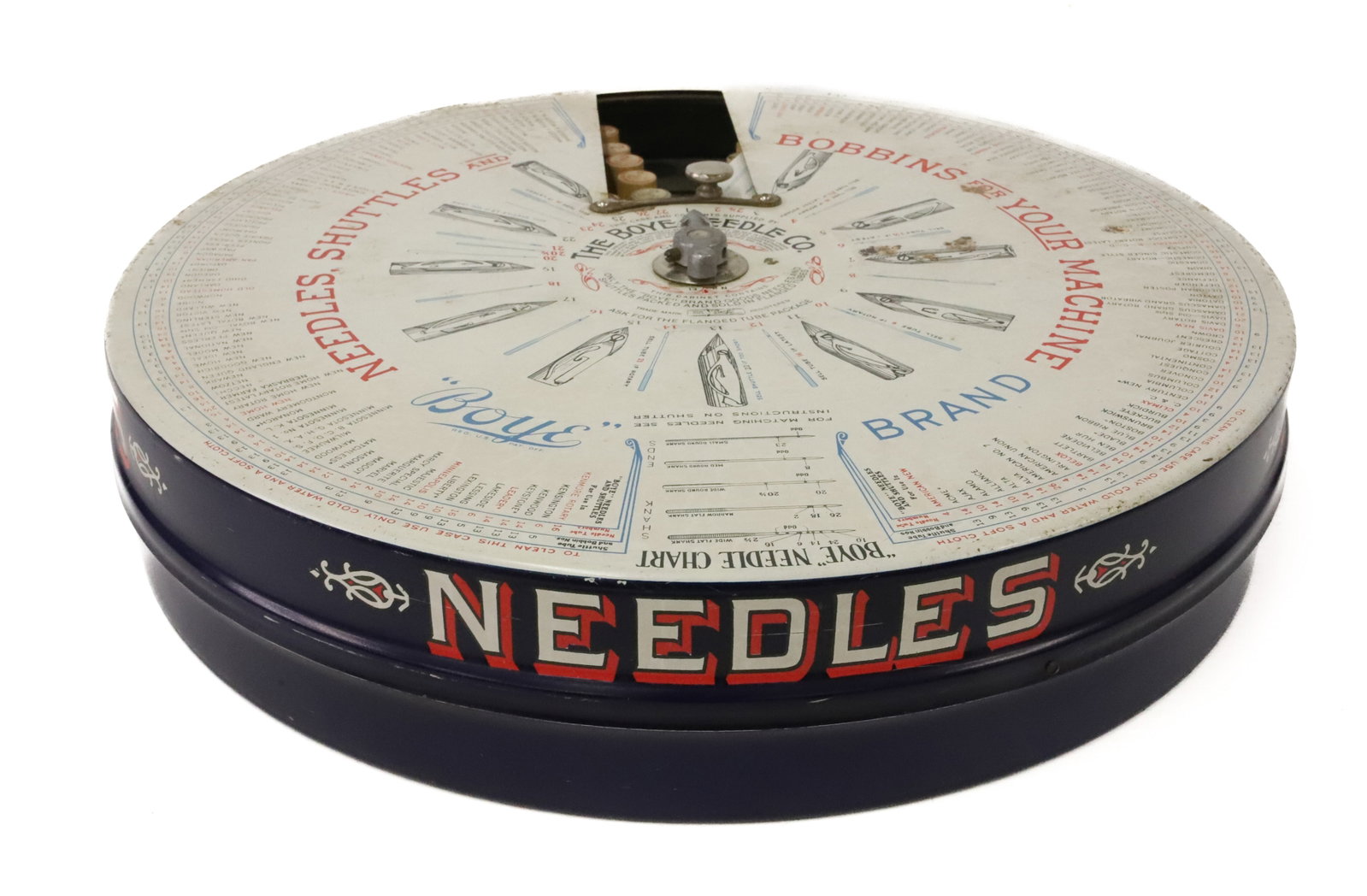 TIN LITHO "BOYE NEEDLE CO." DISPLAY: NEEDLES, SHUTTLES AND BOBBINS FOR YOUR MACHINE, BOYE BRAND 16" D. REVOLVING INTERIOR WITH WOODEN TUBE CONTAINERS. PLEASE READ CAREFULLY - Terms for Purchasing and Shipping of Auction Items. Please rea
