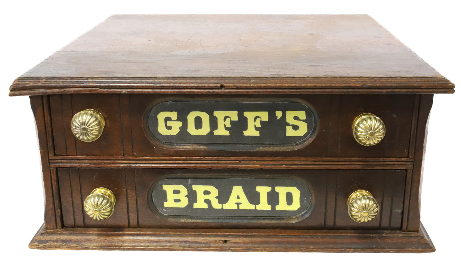 GOFF'S BRAID SPOOL CABINET: TWO-DRAWERS WITH PAPER INSERTS. MRKD. ON BACK "GOFF'S BRAID, BEST MADE". 7 1/2" X 17" X 17 3/4". PLEASE READ CAREFULLY - Terms for Purchasing and Shipping of Auction Items. Please read carefully befor