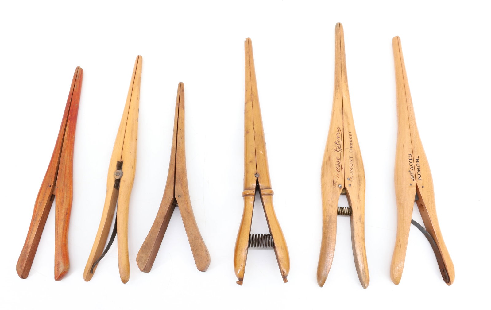 LOT OF WOODEN GLOVE STRETCHERS: (6) WOODEN STRETCHERS 8" TO 11 7/8" LENGTHS. ONE MRKD. "TREFOUSSE GLOVES (FRANCE)" AND "RUSON GLOVES" PLEASE READ CAREFULLY - Terms for Purchasing and Shipping of Auction Items. Please read carefully 