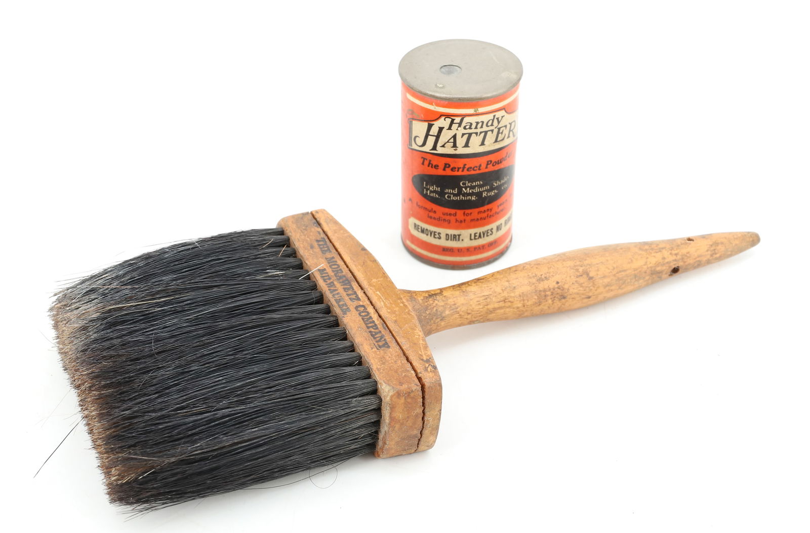 ANTIQUE HAT BRUSH AND POWDER: WEAR MORA HATS, THE MORAWETZ COMPANY, MILWAUKEE 10 1/4" L. WITH "HANDY HATTER" POWDER TIN (PHILADELPHIA). PLEASE READ CAREFULLY - Terms for Purchasing and Shipping of Auction Items. Please read carefu