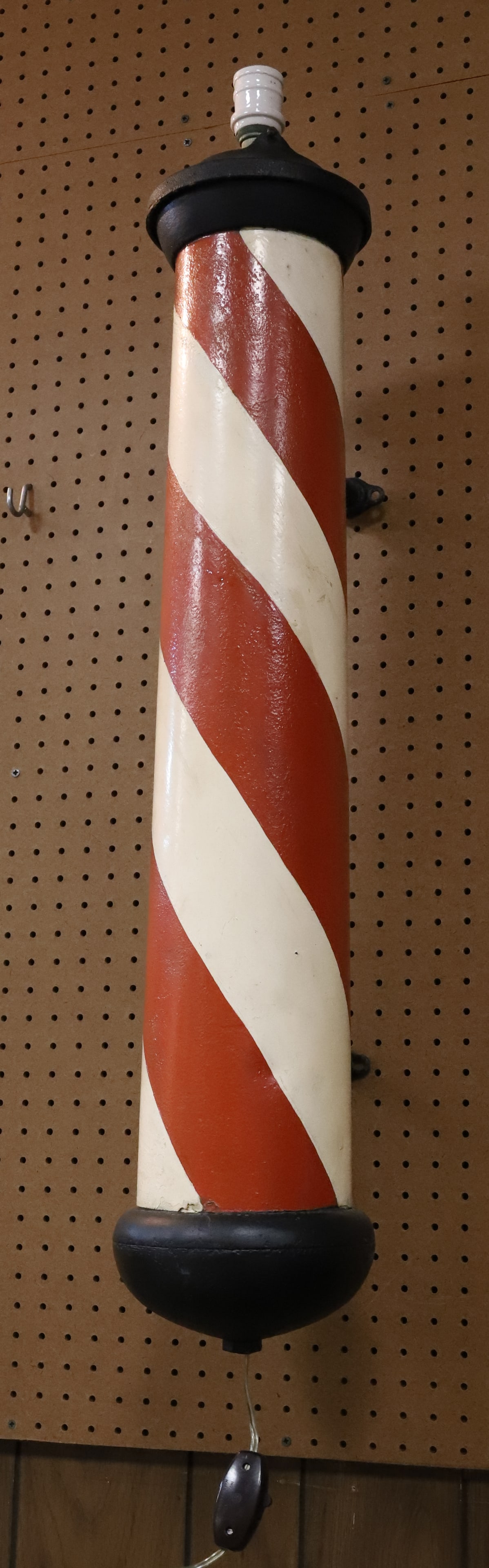 PAINTED METAL BARBER'S POLE: RED/WHITE STRIPES ON POLE. BLACK PAINTED BOTTOM, TOP AND WALL MOUNT. 36" H. PLEASE READ CAREFULLY - Terms for Purchasing and Shipping of Auction Items. Please read carefully before bidding. Hartzell&#