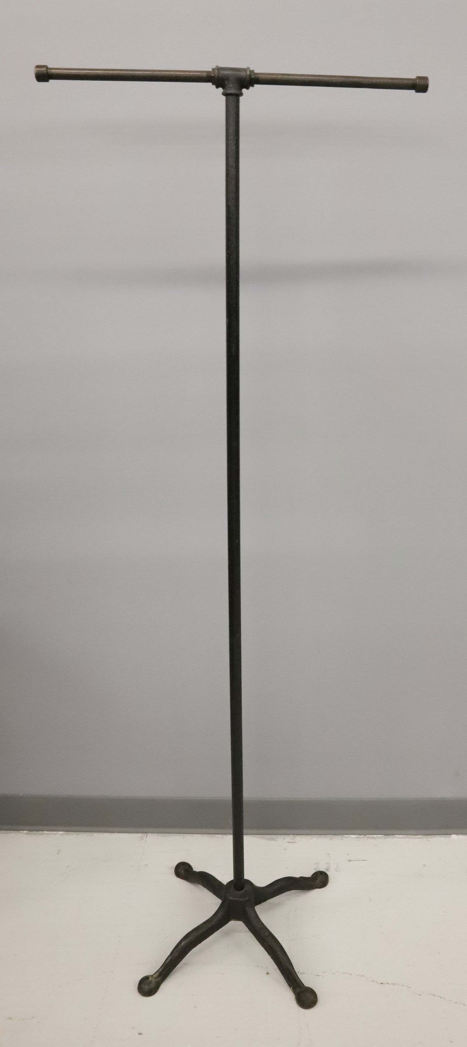 CAST IRON STORE FIXTURE / DISPLAY: MRKD. "GREAT WESTERN FIXTURE WORKS, CHICAGO" AT BOTTOM. DOES NOT ADJUST. 62 1/2" X 22 3/4". PLEASE READ CAREFULLY - Terms for Purchasing and Shipping of Auction Items. Please read carefully before bid