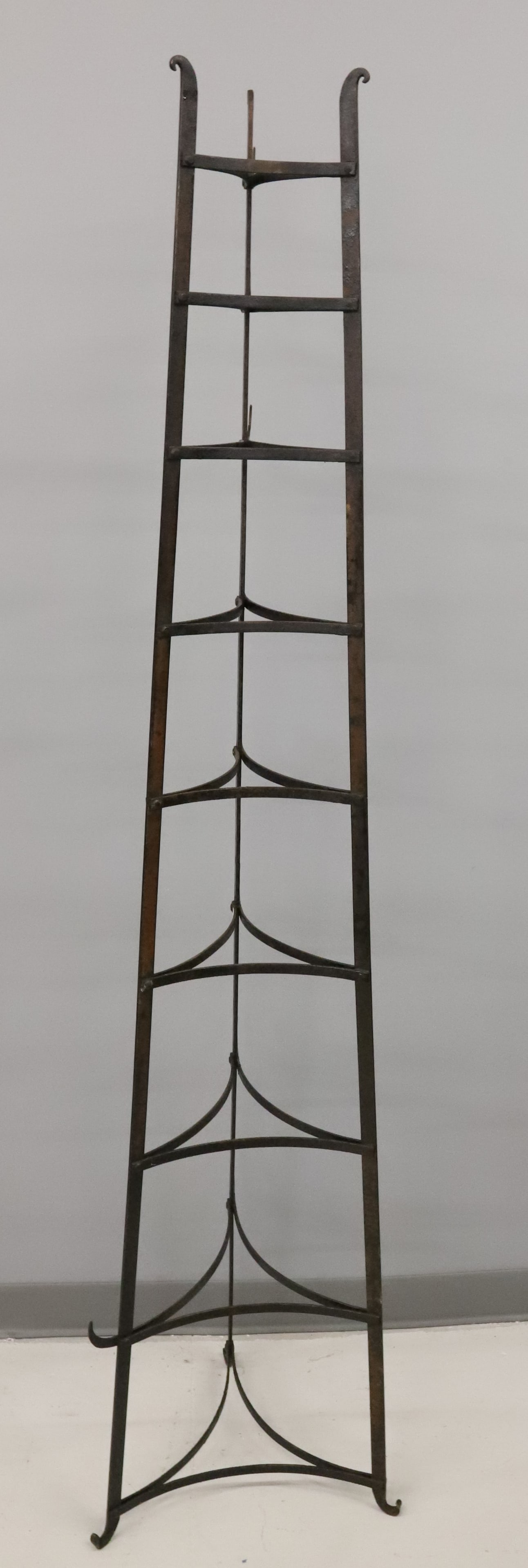 WROUGHT IRON POT RACK / DISPLAY: 72" H. NINE SHELVES 6" TO 13 1/2". HANG HOOKS ON ONE SIDE. PLEASE READ CAREFULLY - Terms for Purchasing and Shipping of Auction Items. Please read carefully before bidding. Hartzell’s Auction Ga