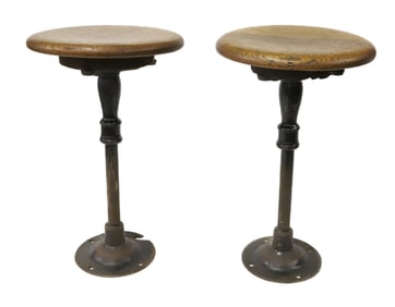 PAIR OF CAST IRON COUNTER STOOLS