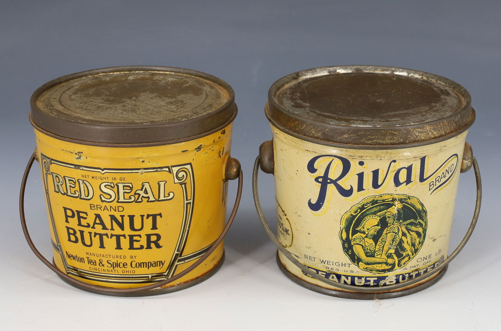 LOT OF (2) PEANUT BUTTER TINS: INCLUDING: RIVAL BRAND (CAMBRIDGE, MASS) 3 1/2" H. AND RED SEAL (CINCINNATI) 3 1/4" H. BOTH HAVE LIDS AND BAIL HANDLES. PLEASE READ CAREFULLY - Terms for Purchasing and Shipping of Auction Items. Plea