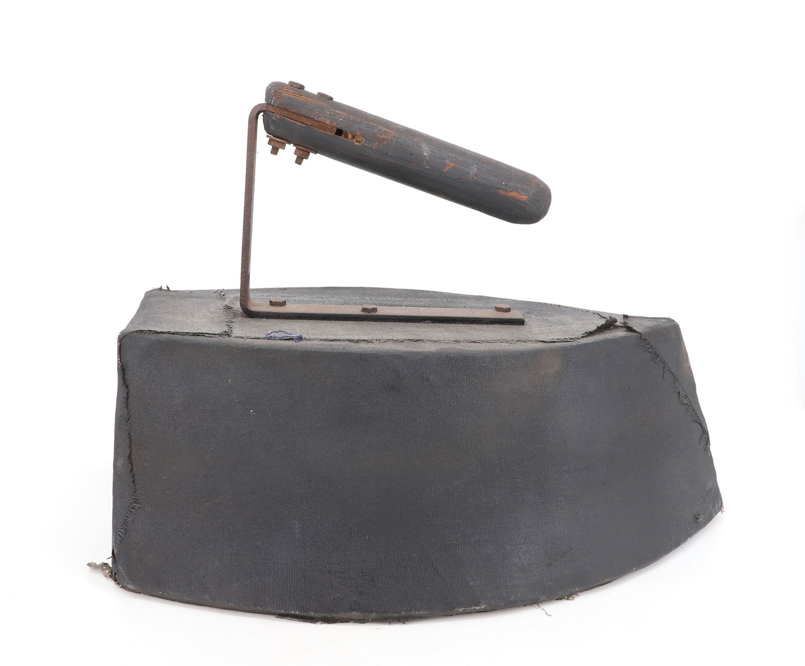 OVERSIZED PRESSING IRON: WOOD / IRON CONSTRUCTION WITH BLACK CANVAS COVERING. 19 1/2" L. PLEASE READ CAREFULLY - Terms for Purchasing and Shipping of Auction Items. Please read carefully before bidding. Hartzell’s Aucti
