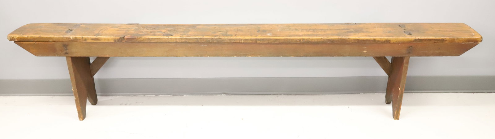 19TH C. MORTISED BENCH: MORTISED CONSTRUCTION WITH BOOTJACK LEGS. 17" X 84 1/4" X 9". PLEASE READ CAREFULLY - Terms for Purchasing and Shipping of Auction Items. Please read carefully before bidding. Hartzell’s Auction