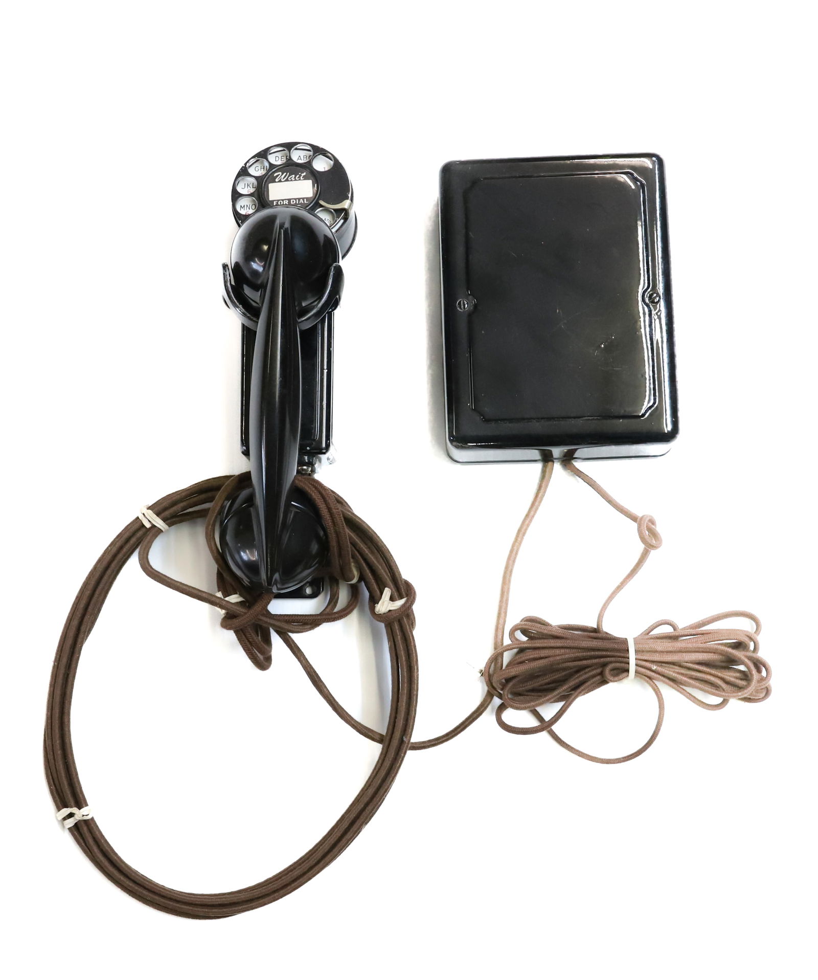 WESTERN ELECTRIC WALL MOUNT TELEPHONE: VINTAGE WALL MOUNTED TELEPHONE, SPACE SAVER ROTARY PHONE. PLEASE READ CAREFULLY - SINCE THIS IS A COIN SALE PLEASE NOTE. ITEMS MUST BE PAID FOR THROUGH LIVE AUCTIONEERS OR WITH CASH OR CHECK IN