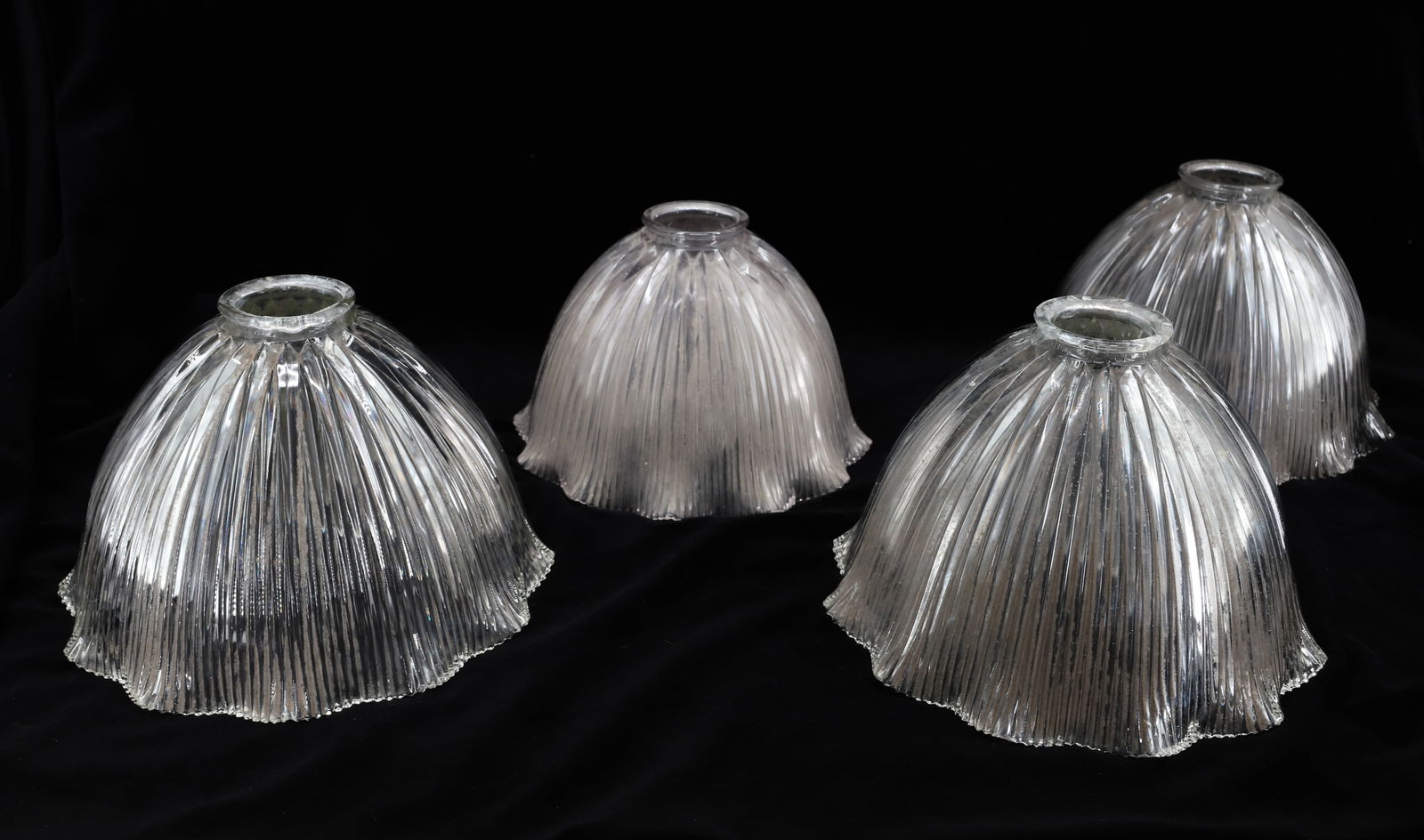 LOT OF (4) HOLOPHANE SHADES: RIBBED WITH RUFFLED EDGES, (3) MATCHING WITH 8 1/2" AND 2 1/4" OPENINGS, OTHER MEASURES 7 3/4" X 2 1/4" OPENINGS PLEASE READ CAREFULLY - SINCE THIS IS A COIN SALE PLEASE NOTE. ITEMS MUST BE PAID