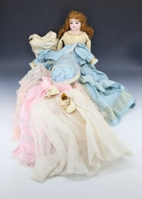 BISQUE DOLL WITH LEATHER BODY