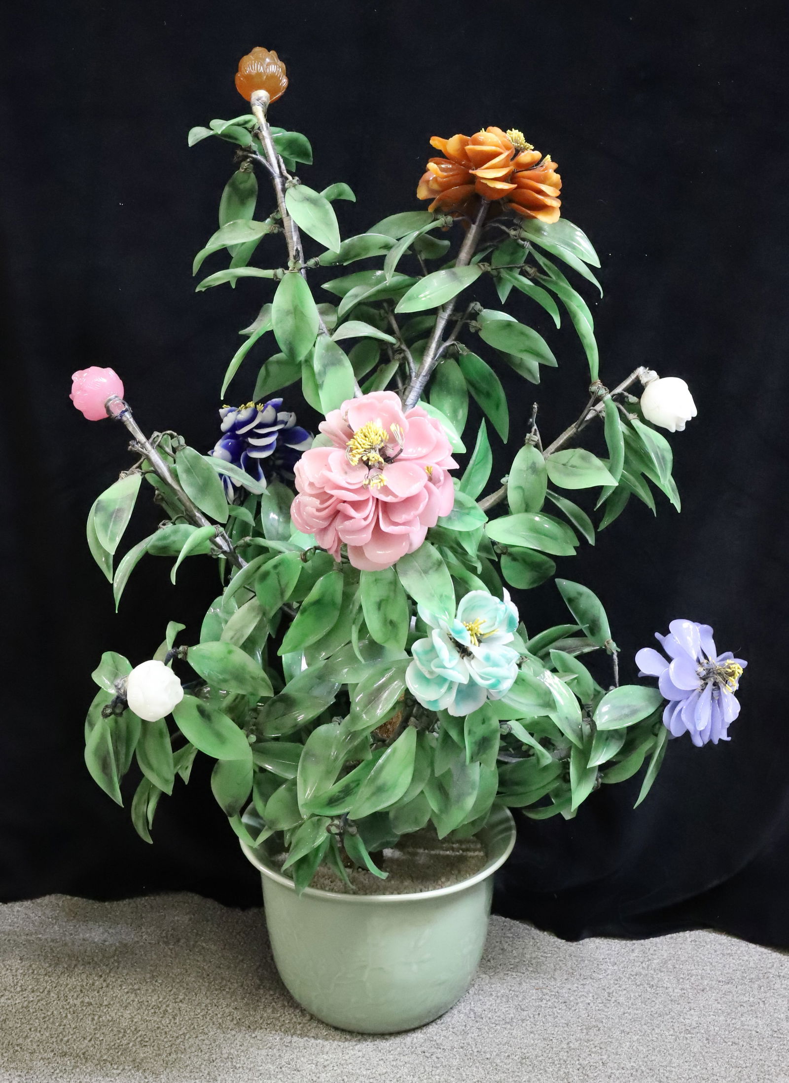 CHINESE PEKING GLASS FLOWER TREE, BONSAI: WOOD, WIRE, AND GLASS. 35" H. GREEN PORCELAIN EMBOSSED POT. THIS ITEM CANNOT BE SHIPPED IN-HOUSE DUE TO WEIGHT AND FRAGILITY. WINNING BIDDER IS RESPONSIBLE FOR PICKING UP IN 18013 OR SECURING