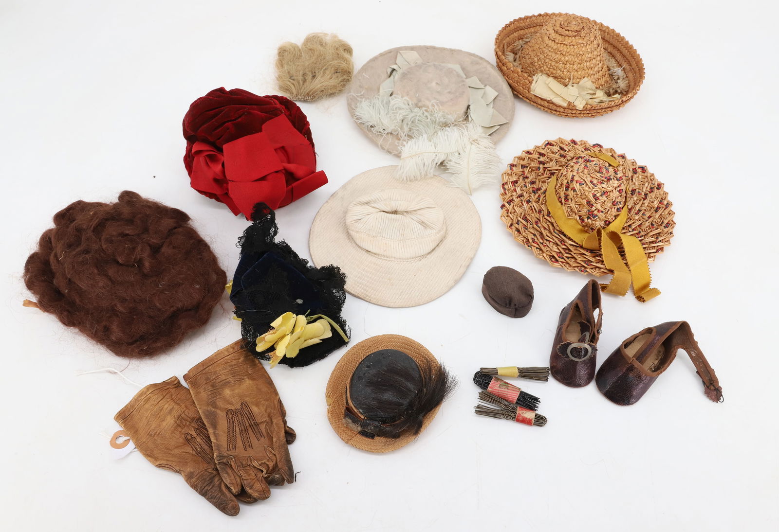 ANTIQUE DOLL HATS AND ACCESSORIES: (6) HATS, CLOTH, WICKER ETC, LEATHER GLOVES,TWO WIGS , PAIR OF SHOES , BOBBY PINS 5 1/2" DIA PLEASE READ CAREFULLY - Terms for Purchasing and Shipping of Auction Items. Please read carefully