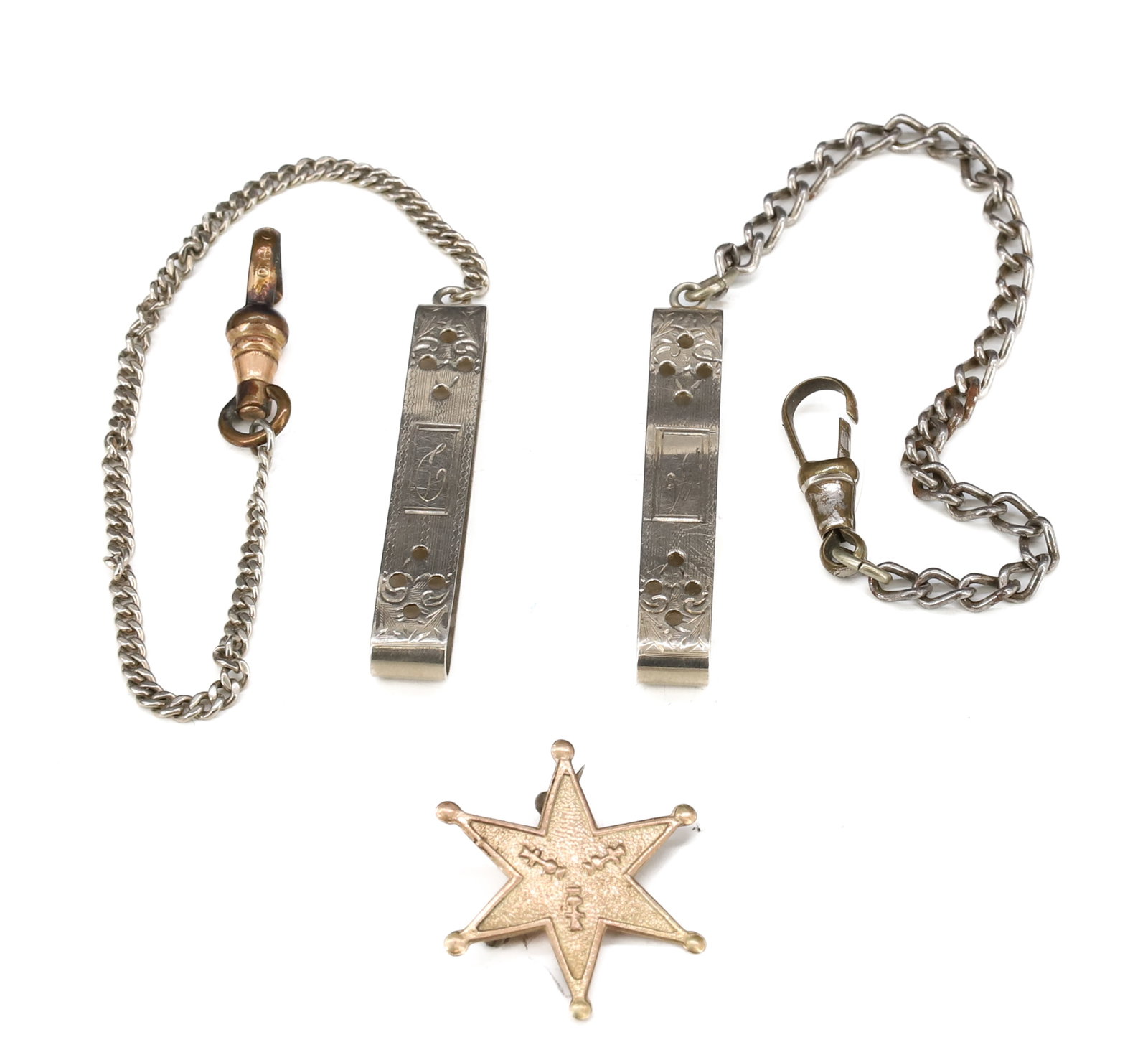 (2) 10K WHITE GOLD FOBS AND STAR PIN: 10K WHITE GOLD BELT LOOP FOBS ONE CHAIN IS GOLD OTHER METAL VICTORIAN STAR PIN 6/8 KT APPROXIMATELY 4.5 DWT PLUS METAL PARTS PLEASE READ CAREFULLY - SINCE THIS IS A COIN SALE PLEASE NOTE.