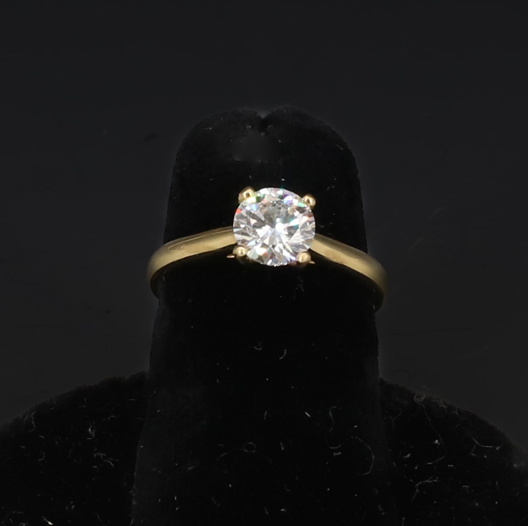 18K YELLOW GOLD 1 CT DIAMOND RING: ROUND 1 CARAT WITH CERTIFICATION #LG667415276 SIZE 6 TOTAL WEIGHT 2. DWT PLEASE READ CAREFULLY - SINCE THIS IS A COIN SALE PLEASE NOTE. ITEMS MUST BE PAID FOR THROUGH LIVE AUCTIONEERS OR WITH CASH