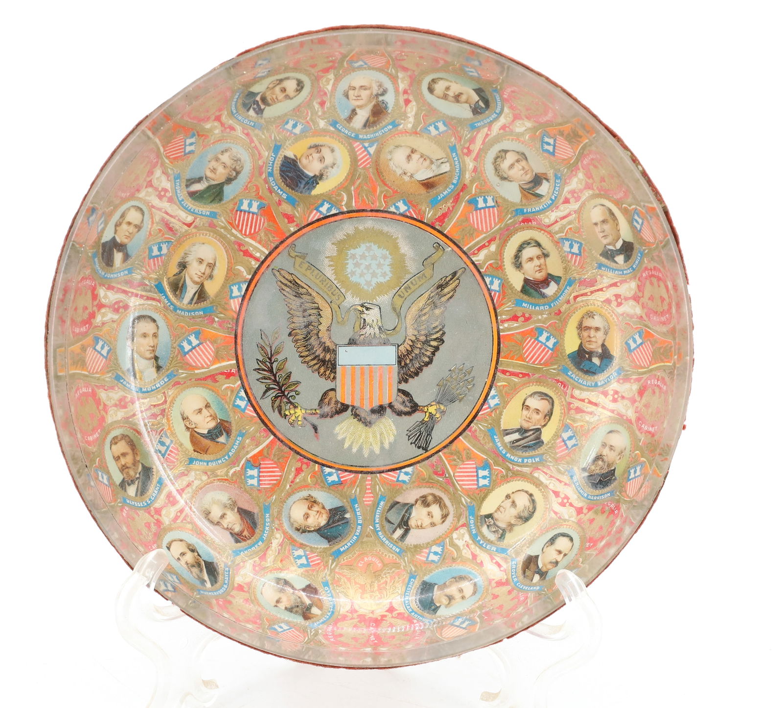 CIGAR BAND DECORATED BOWL: SHALLOW GLASS BOWL WITH VARIOUS PRESIDENT'S PORTRAITS FROM CIGAR BANDS. CENTRAL EAGLE. RED FELT BOTTOM. 7 1/2" D. PLEASE READ CAREFULLY - SINCE THIS IS A COIN SALE PLEASE NOTE. ITEMS MUST BE PAID FOR