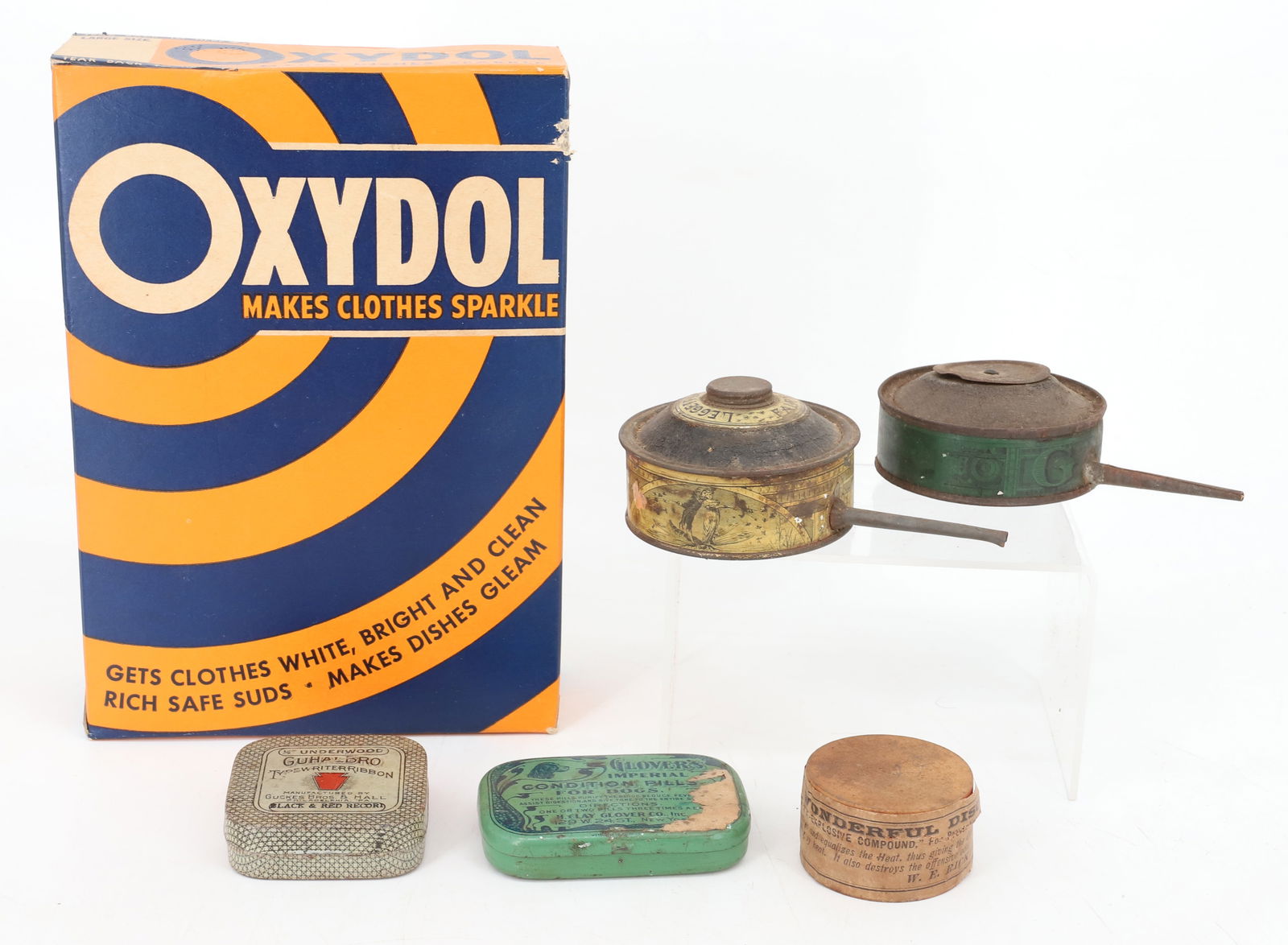 GROUP LOT OF ADVERTISING: INCLUDING: UNOPENED BOX OF OXYDOL 8 1/2" H., (4) LITHO TINS: GLOVER IMPERIAL CONDITION PILLS FOR DOGS, GUHALBRO TYPEWRITER RIBBON, G&R SPRAY BUG POWDER, LEGGETT'S FAIRY GUN (1888) AND WOODEN "PROF. ED