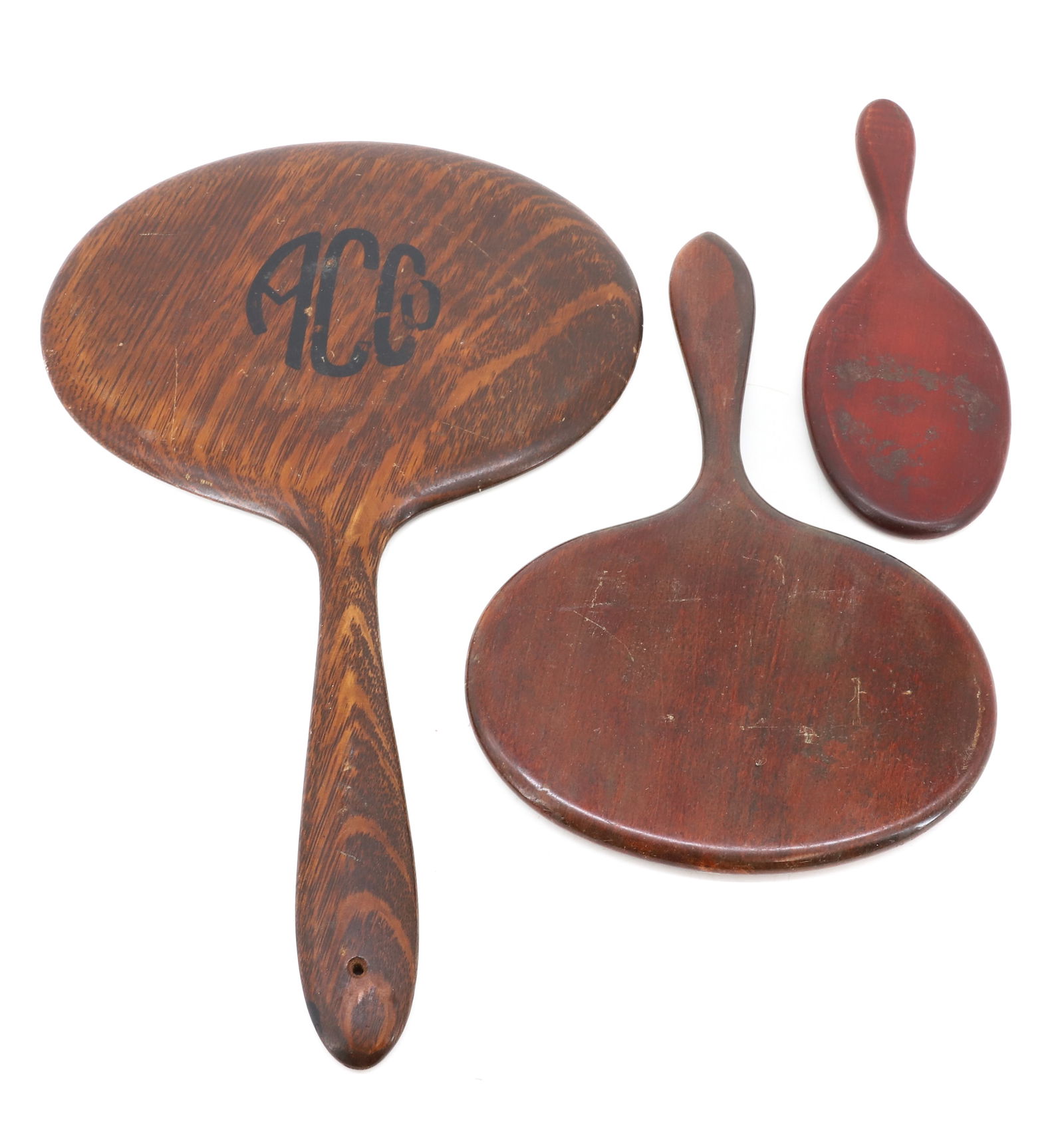 LOT OF (3) HAND MIRRORS: ANTIQUE WOODEN MIRRORS. BEVELED GLASS. LARGEST MONOGRAMMED ON BACK. 9 1/4" TO 15 3/4" LENGTHS. PLEASE READ CAREFULLY - SINCE THIS IS A COIN SALE PLEASE NOTE. ITEMS MUST BE PAID FOR THROUGH LIVE AUCTIO