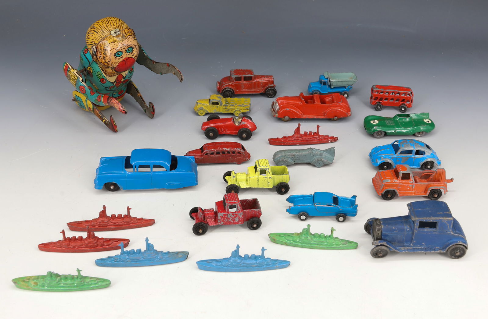 TIN MECHANICAL MONKEY, TOOTSIE TOY CARS AND SHIPS (1 of 4)