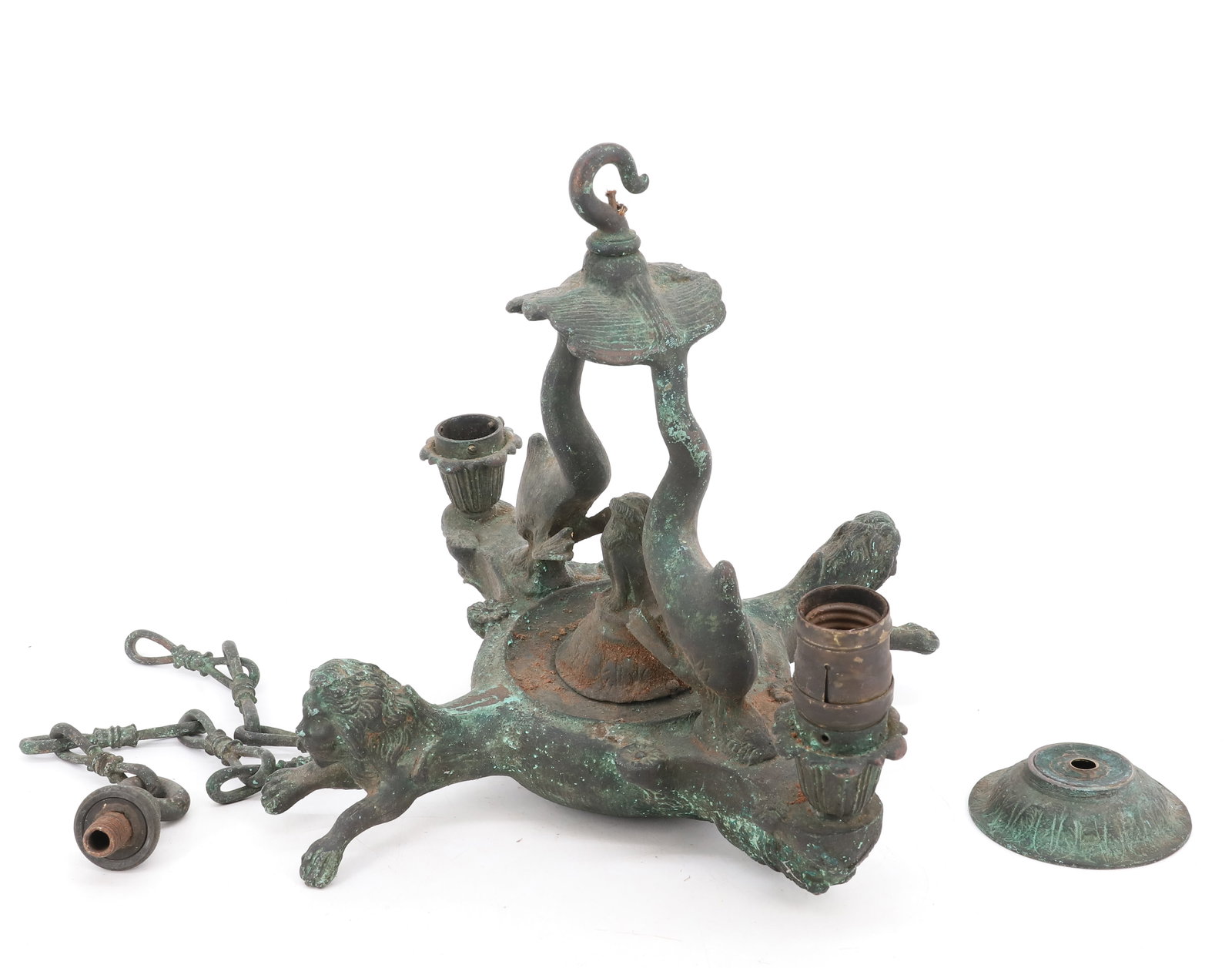 HEAVY BRONZE HALL LIGHT: FLORENTINE-STYLE OIL LAMP WITH DOLPHINS AND LIONS. INCLUDES CHAIN AND CAP. MRKD. A3393. 11 1/4" X 12" X 12". CHAIN 19 1/2" L. PLEASE READ CAREFULLY - SINCE THIS IS A COIN SALE PLEASE NOTE. ITEMS MUST