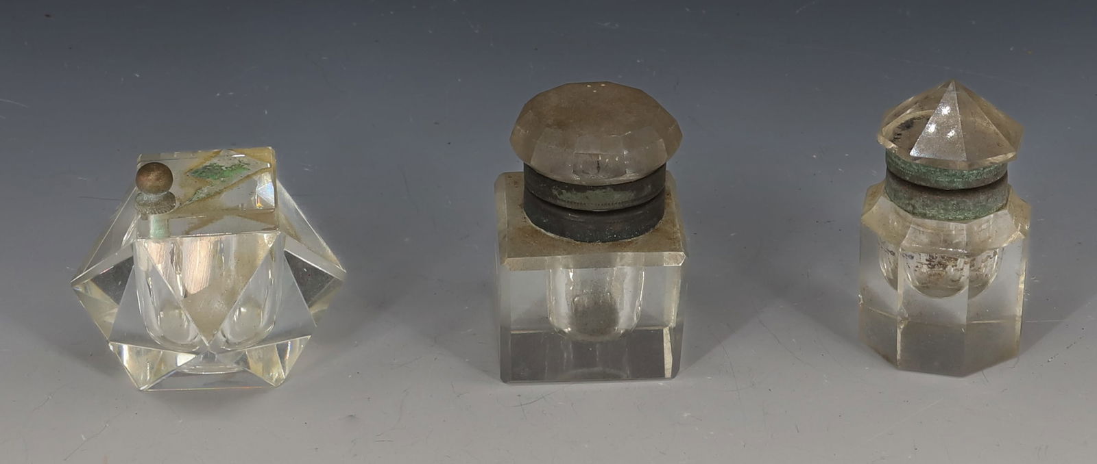 (3) ANTIQUE GLASS INKWELLS: HINGED LIDS. TALLEST IS 2 3/8". PLEASE READ CAREFULLY - SINCE THIS IS A COIN SALE PLEASE NOTE. ITEMS MUST BE PAID FOR THROUGH LIVE AUCTIONEERS OR WITH CASH OR CHECK IN PERSON - Terms for