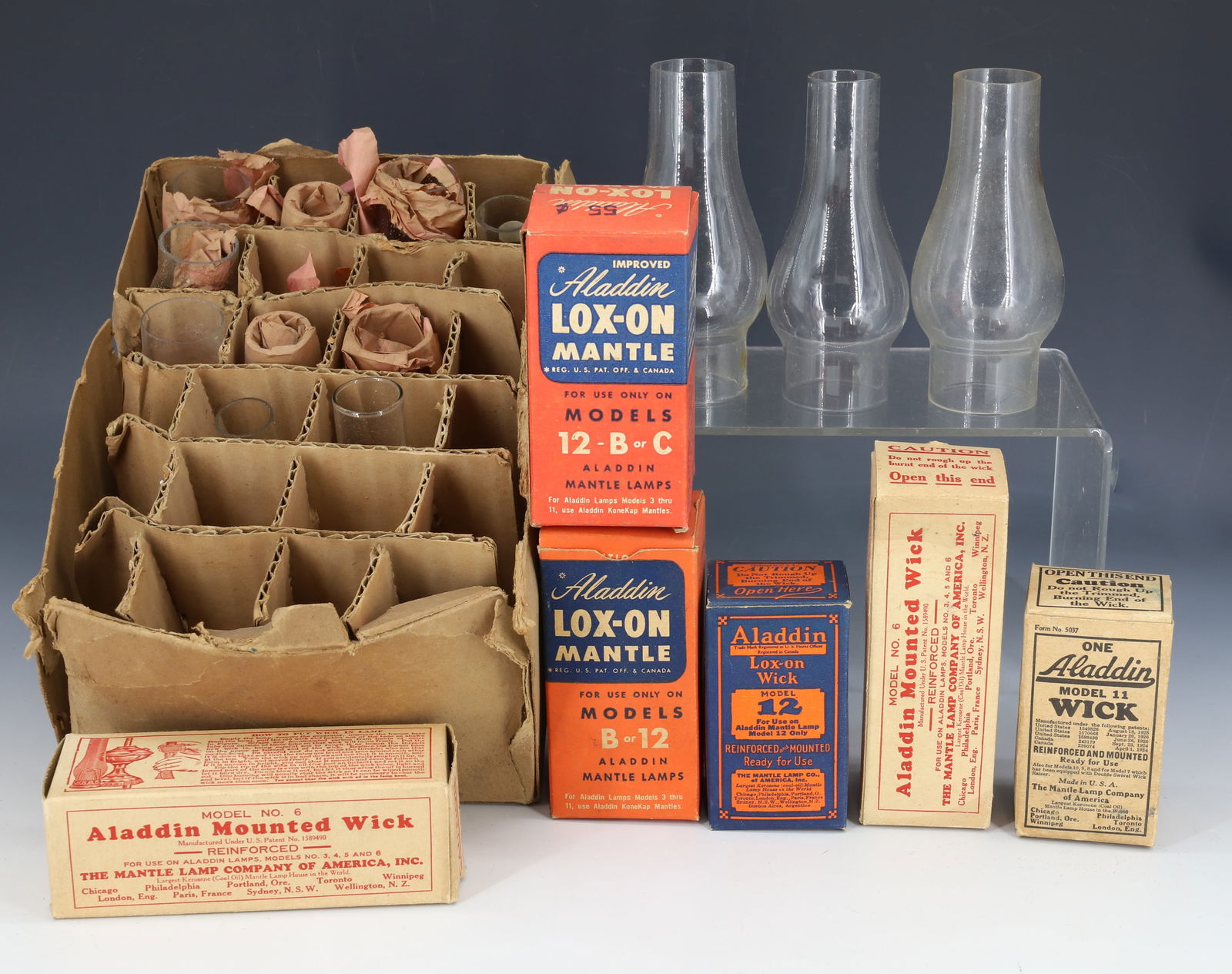 LOT OF SMALL CHIMNEYS AND LAMP PARTS (1 of 7)