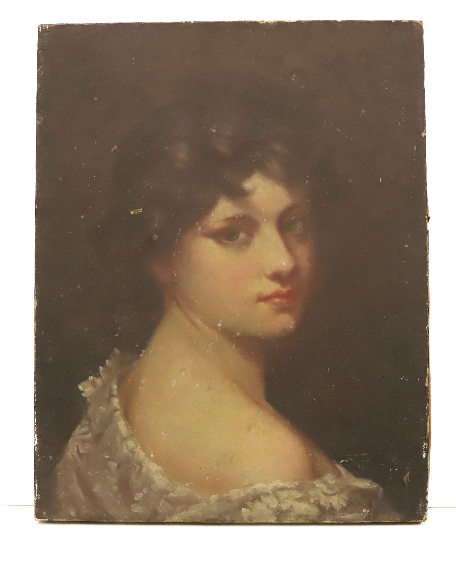 PORTRAIT OF A WOMAN, OIL ON CANVAS: YOUNG WOMAN LOOKING OVER SHOULDER. UNSIGNED. UNFRAMED. 18" X 14". PLEASE READ CAREFULLY - SINCE THIS IS A COIN SALE PLEASE NOTE. ITEMS MUST BE PAID FOR THROUGH LIVE AUCTIONEERS OR WITH CASH OR CHECK I