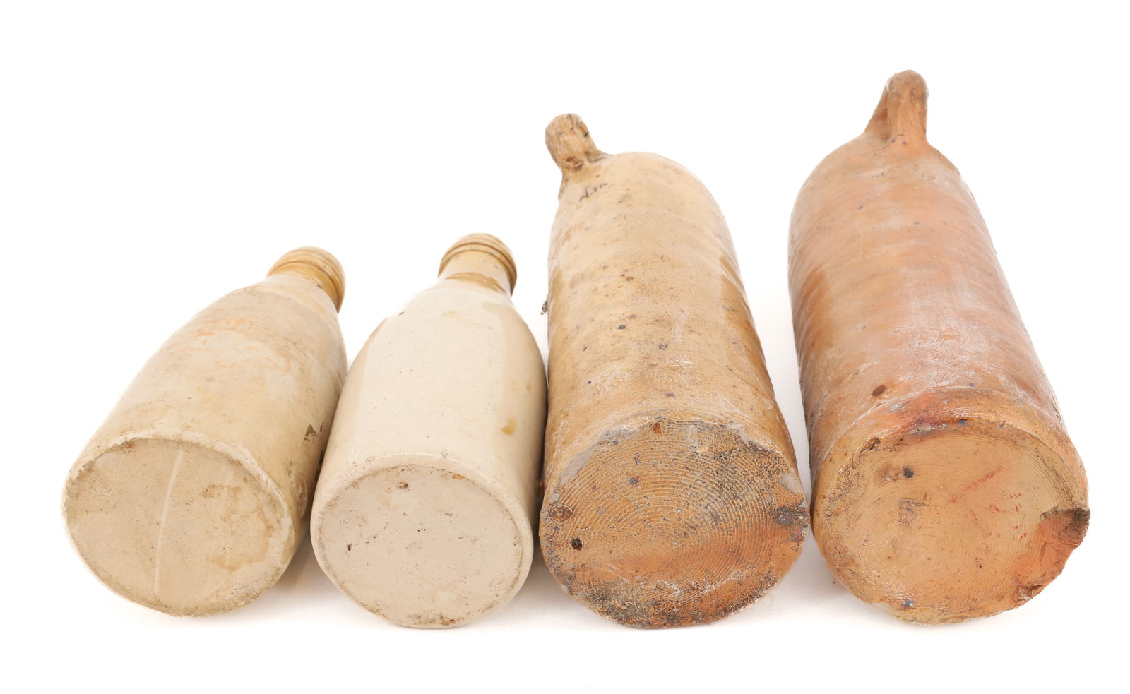 (4) STONEWARE BOTTLES - 9