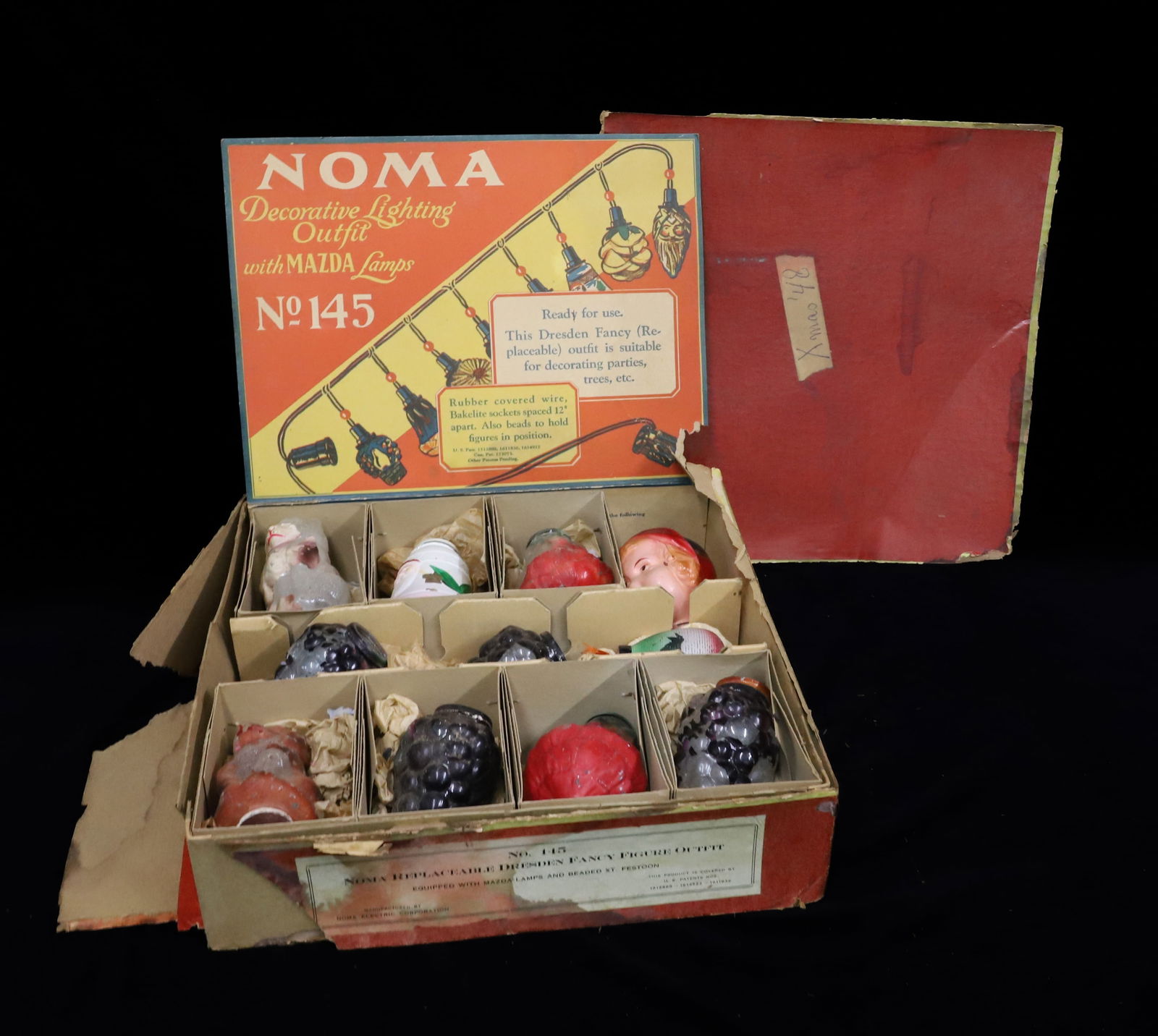 NOMA NO. 145 CHRISTMAS LIGHTING SET: NOMA REPLACEABLE DRESDEN FANCY FIGURE OUTFIT. (11) PAINTED BULBS IN ORIGINAL BOX. 12 1/2 X 12 1/2". LARGEST BULB 4" L.