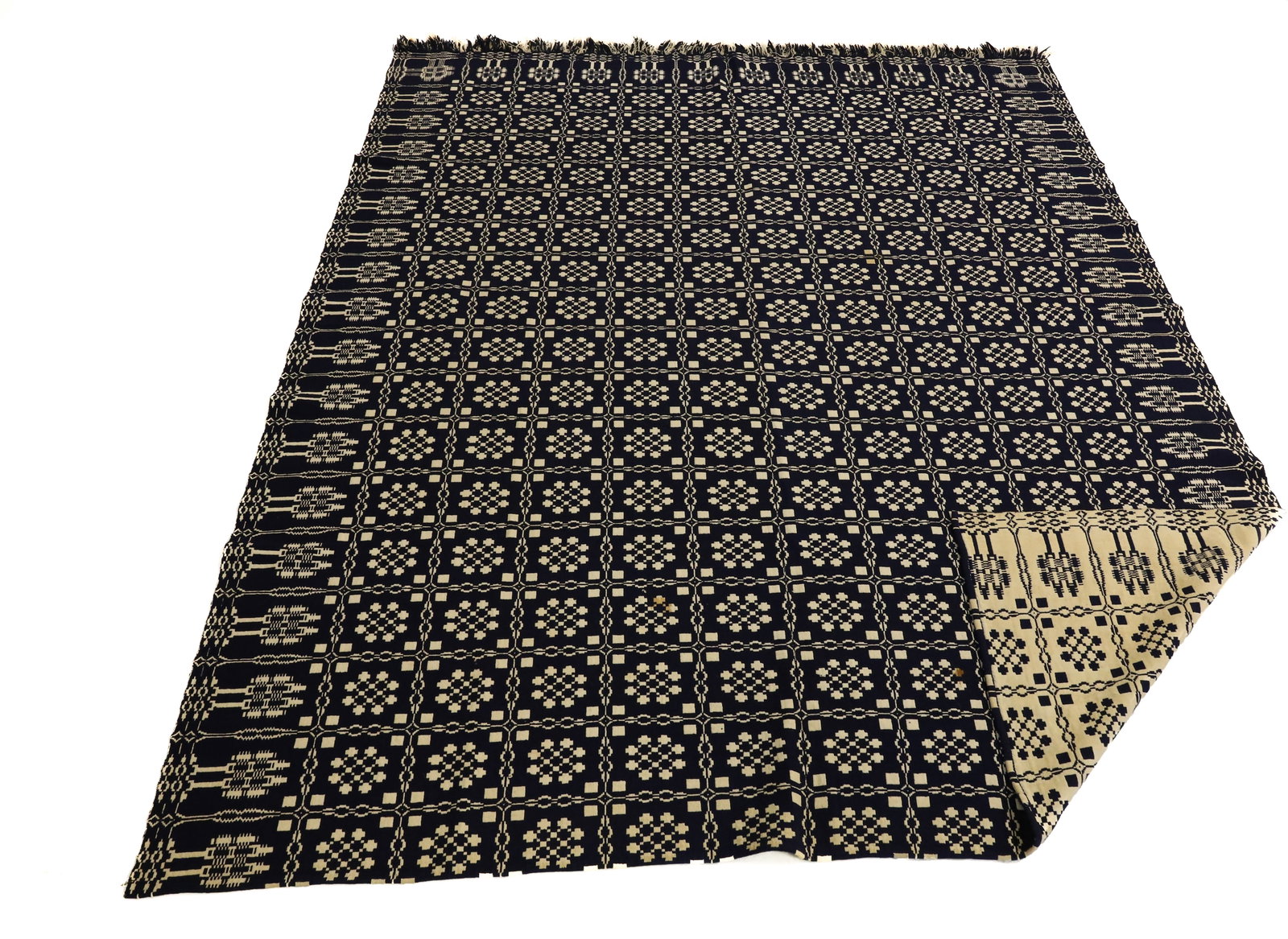 19TH C. BLUE / WHITE COVERLET: SNOWBALL AND TREE DECORATION. MRKD. E.T. 89" X 73".