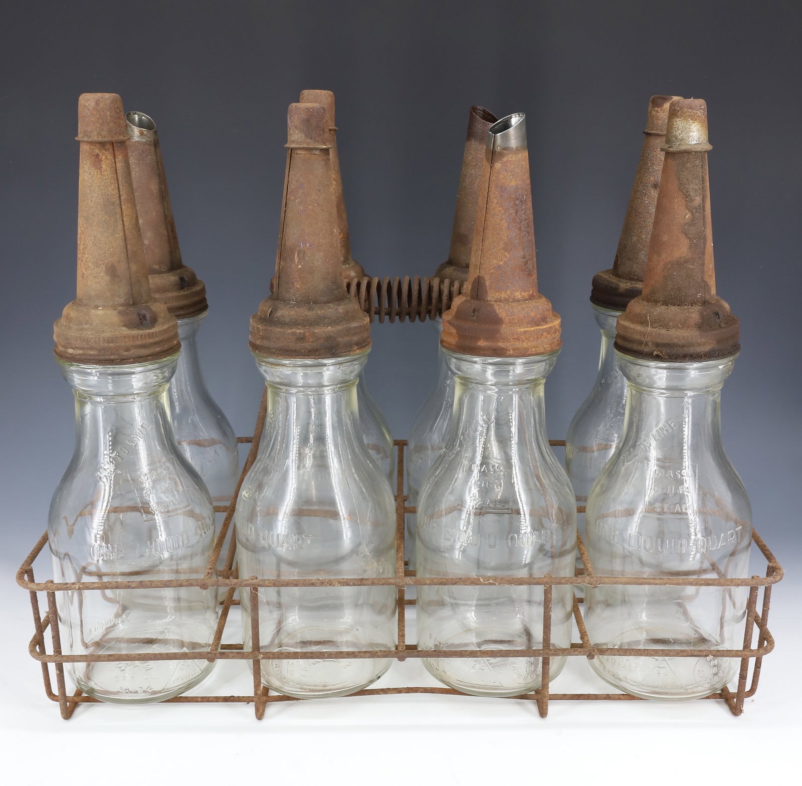 ANTIQUE OIL BOTTLES / CARRIER (1 of 5)