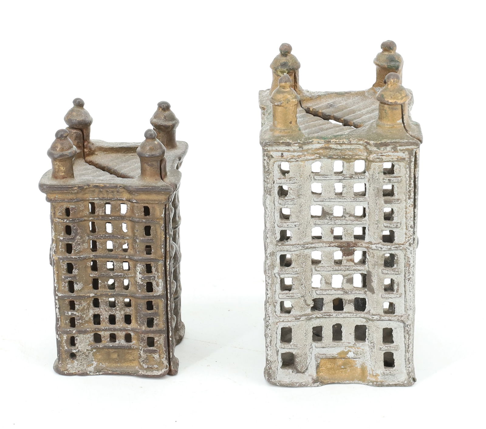 (2) CAST IRON "SKYSCRAPER" STILL BANKS: GOLD / SILVER PAINT. 3 1/2" X 1 3/4" AND 4 1/4" X 2 1/8".